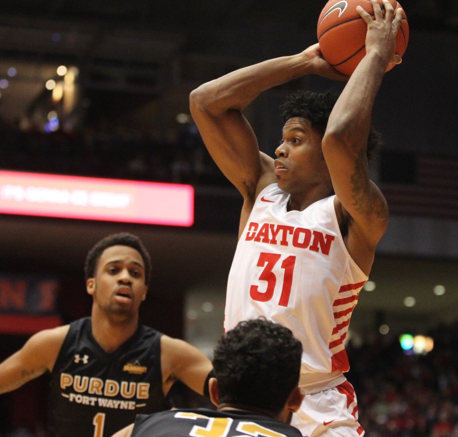 Dayton’s Jhery Matos makes a pass against Purdue Fort Wayne on Friday, Nov. 16, 2018, at UD Arena. David Jablonski/Staff