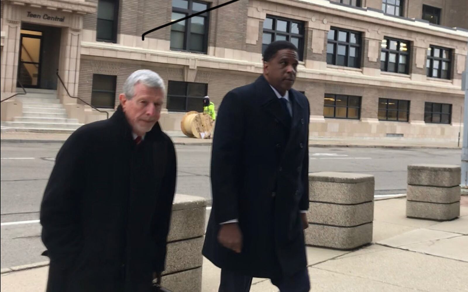 Former Dayton City Commissioner Joey Williams (right) outside the federal building in Dayton Wednesday. Photo by Jim Otte.