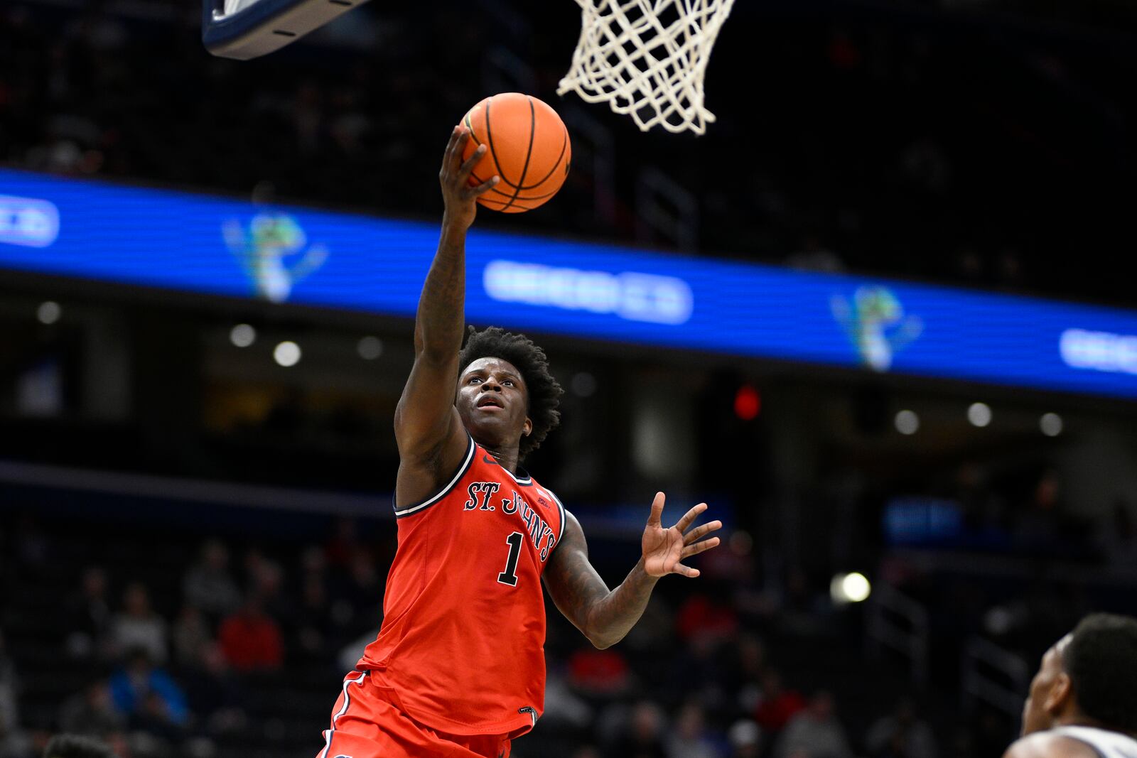 St. John's guard Kadary Richmond (1) goes to the basket during the second half of an NCAA college basketball game against Georgetown, Tuesday, Jan. 28, 2025, in Washington. (AP Photo/Nick Wass)