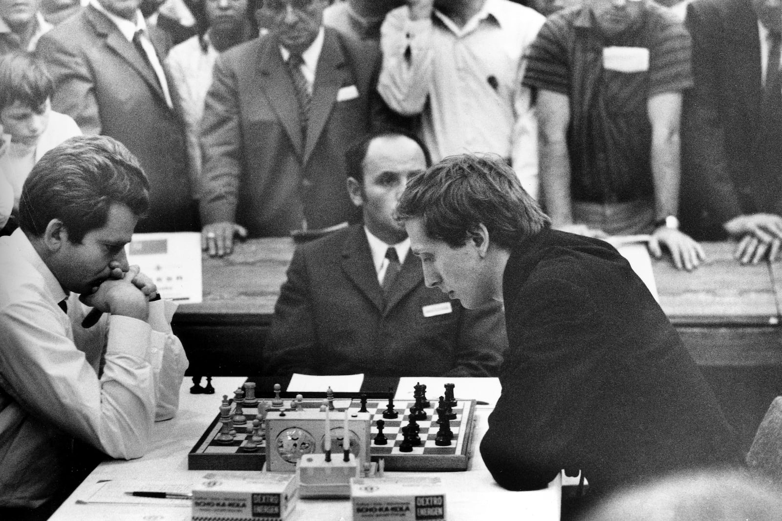 FILE - Reigning chess world champion Boris Spassky, left, of Russia, and international grandmaster Bobby Fischer of the United States, are seen during a game at the XIX World Chess Olympiad in Siegen, Germany, Sept. 20, 1970. (AP Photo/Heinz Ducklau, File)