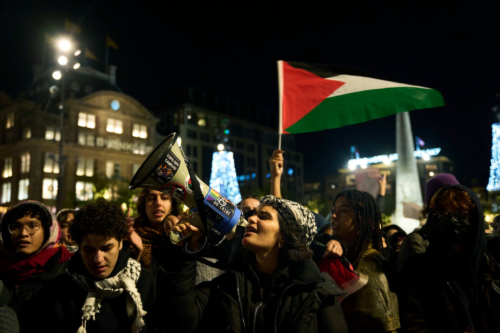 Pro-Palestinian supporters protest in Amsterdam, Netherlands, Wednesday, Nov. 13, 2024, despite a new city ban on such gatherings. (AP Photo/Bram Janssen)