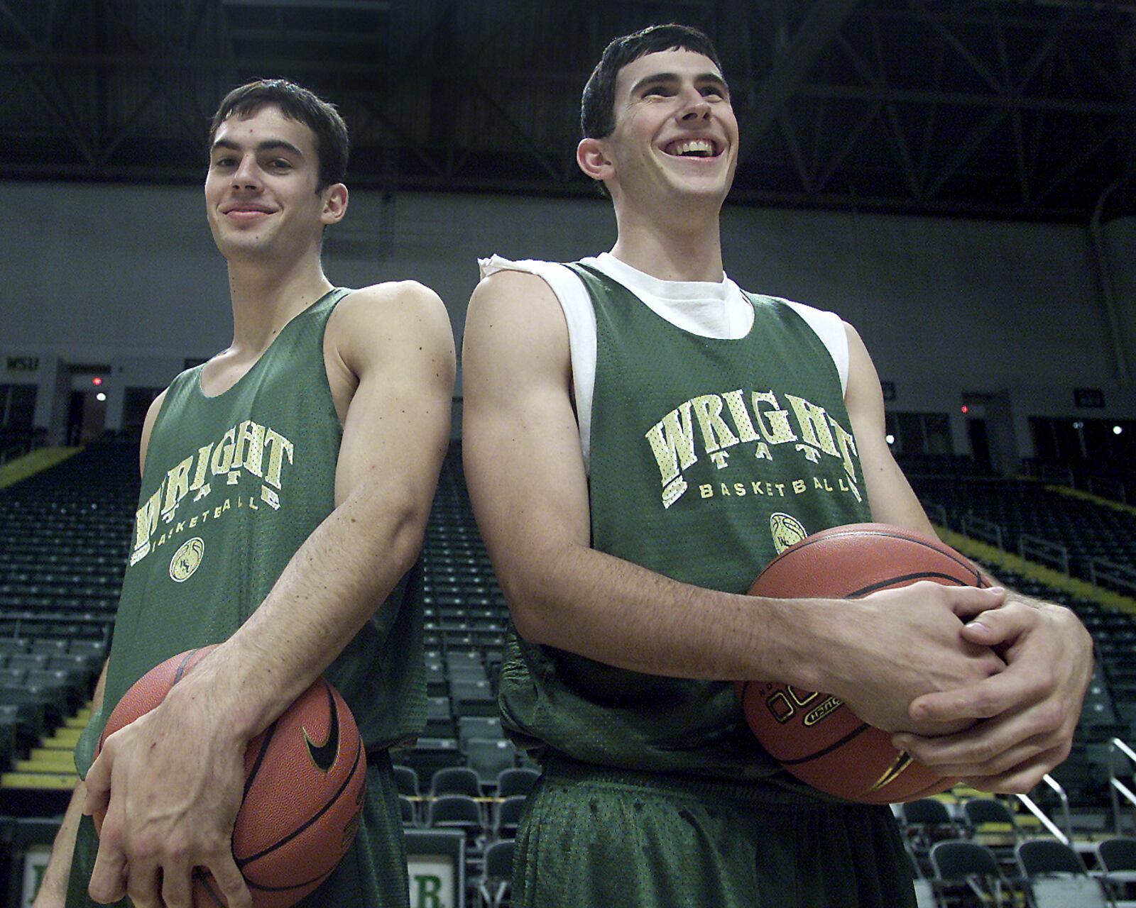 Wright State basketball players Seth Doliboa, left, and his brother Cain Doliboa, right, stand together before practice at the Ervin J. Nutter Center on Tuesday, October 30, 2001.