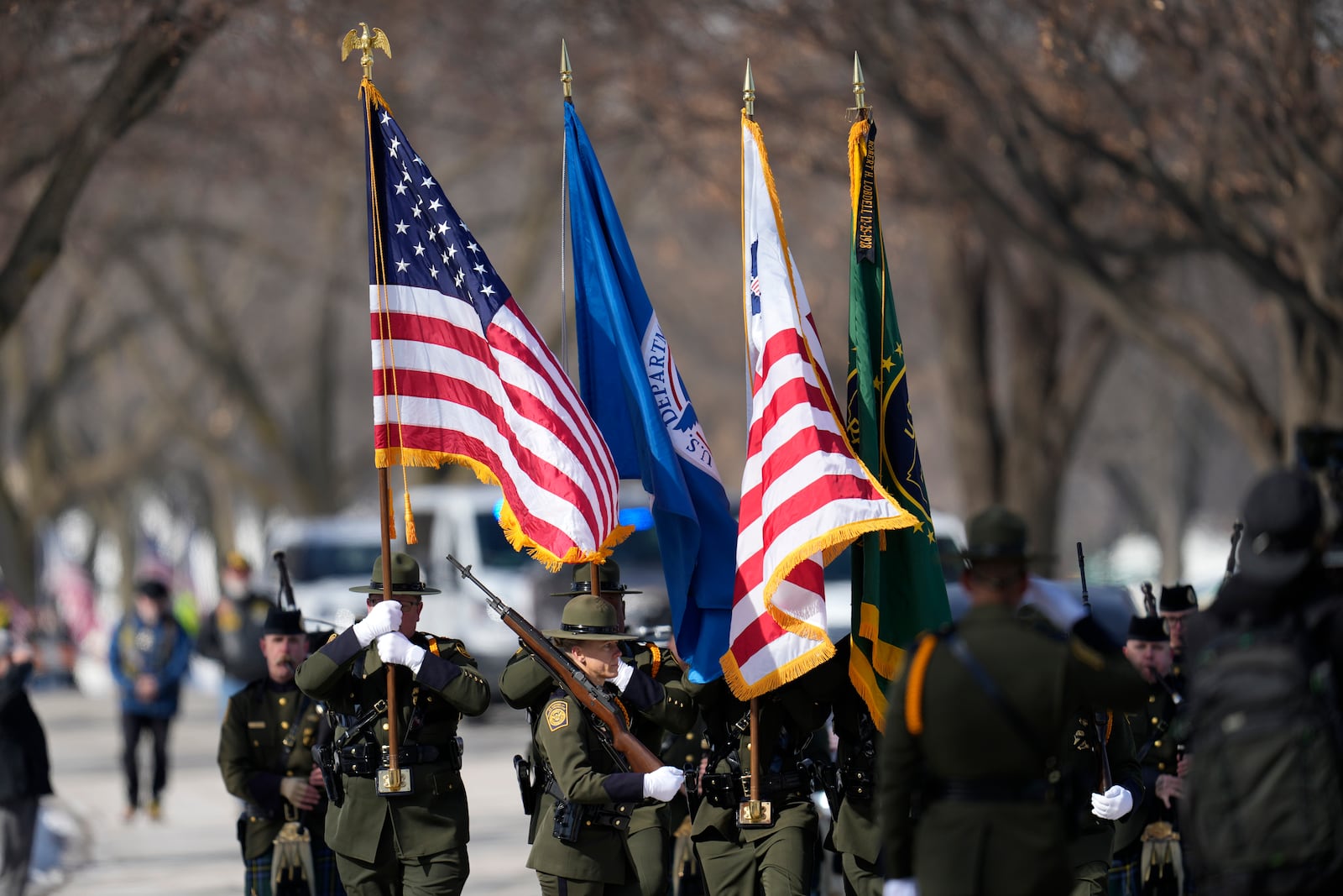 Members of the Color Guard arrive before a service for U.S. Border Patrol agent David Maland to be recognized with military honors before his burial at Fort Snelling National Cemetery in Minneapolis, on Saturday, Feb. 22, 2025. (AP Photo/Abbie Parr)