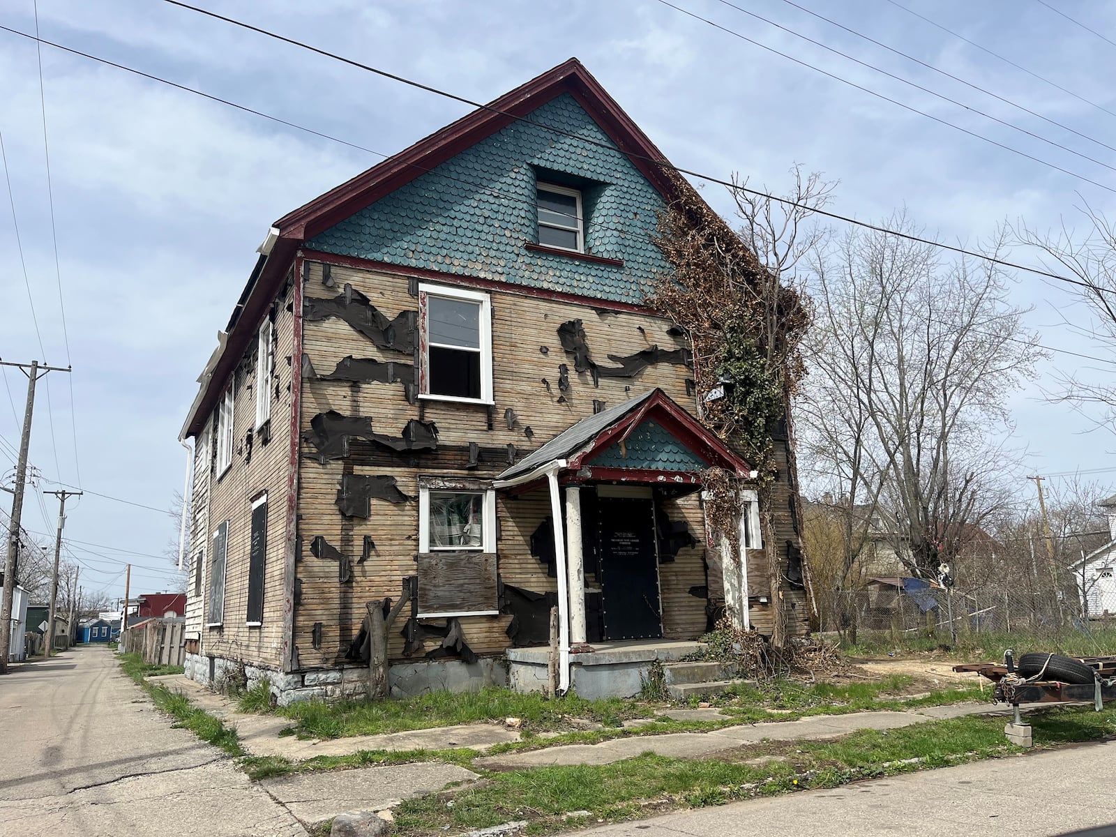 A vacant and deteriorating home in East Dayton. CORNELIUS FROLIK / STAFF