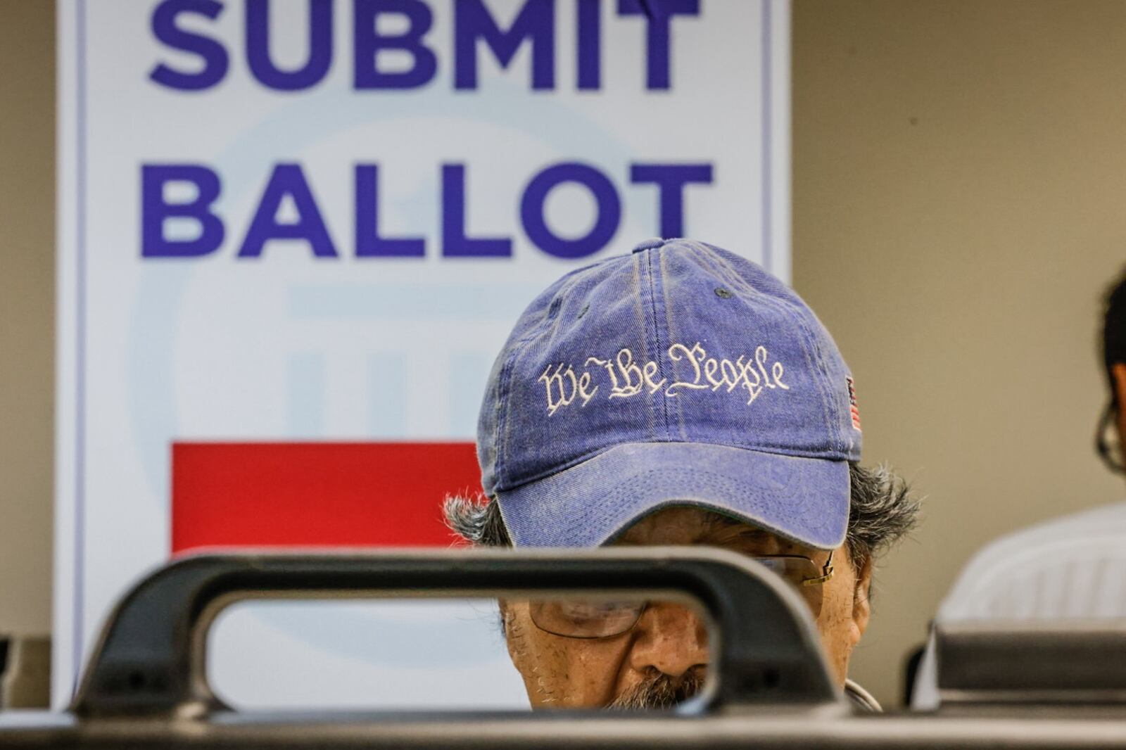 Dr. Juan Gotos from Centerville votes early at the Montgomery County Board of Elections Tuesday October 8, 2024. Jim Noelker/Staff