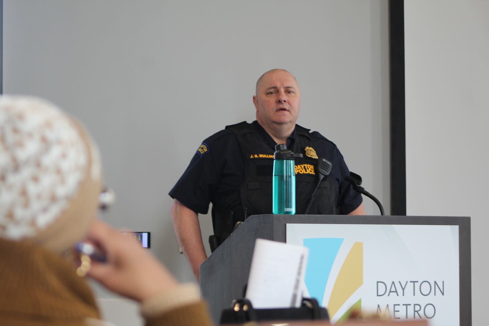 Dayton police Major James Mullins speaks at a public information meeting on Tuesday, Jan. 31, 2023, about Fusus technology that would allow police to access privately owned security cameras. CORNELIUS FROLIK / STAFF