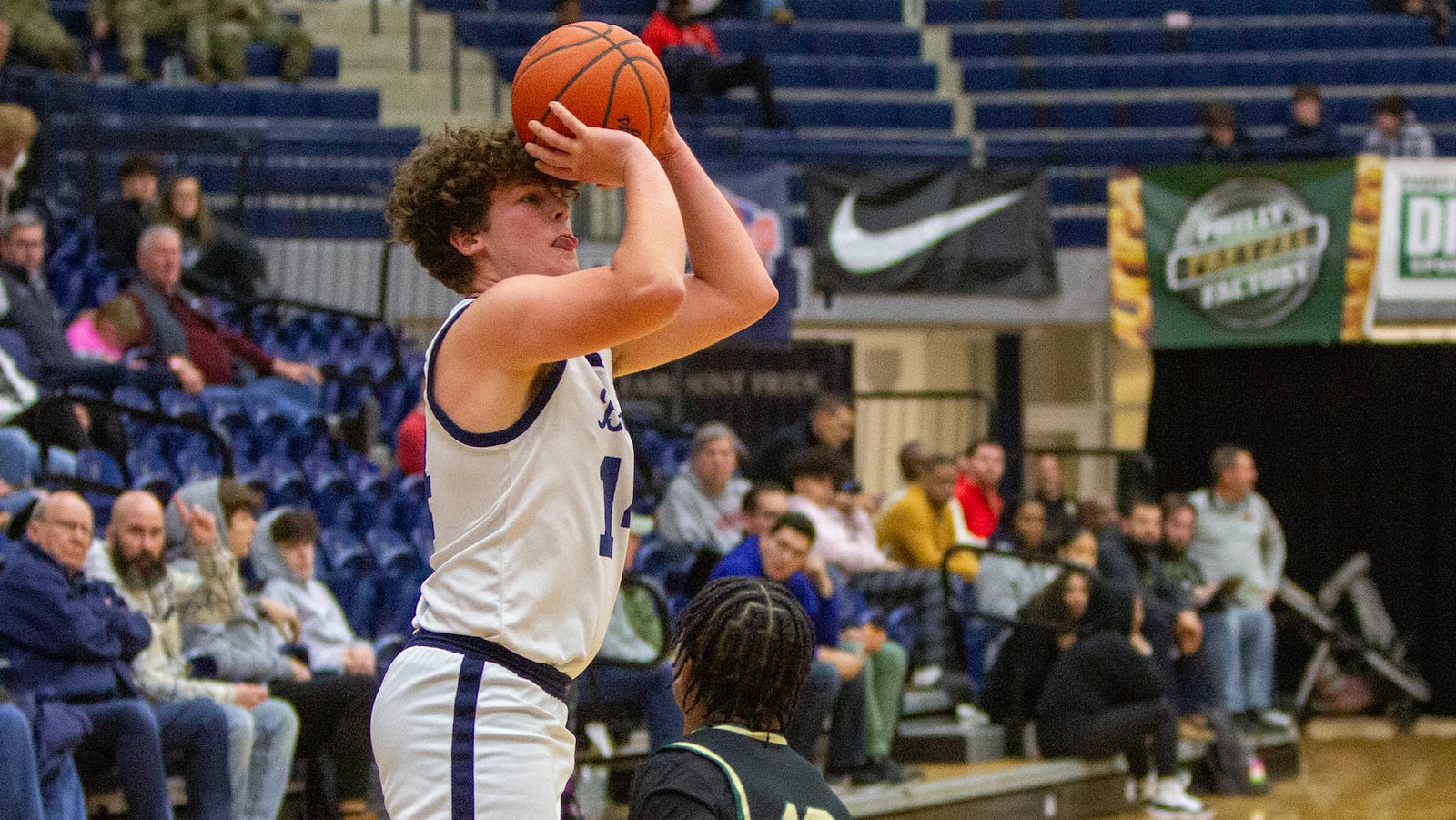 Fairmont's Evan Gentile shoots against Sycamore during last year's Flyin' To The Hoop finale at Trent Arena. Jeff Gilbert/CONTRIBUTED