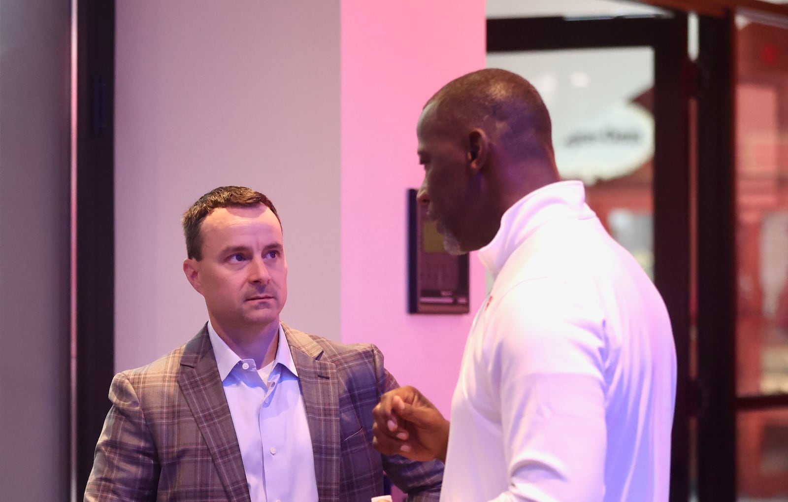 Rhode Island's Archie Miller talks to Dayton's Anthony Grant during Atlantic 10 Conference Media Day on Monday, Oct. 7, 2024, at District E next to Capital One Arena in Washington, D.C. David Jablonski/Staff