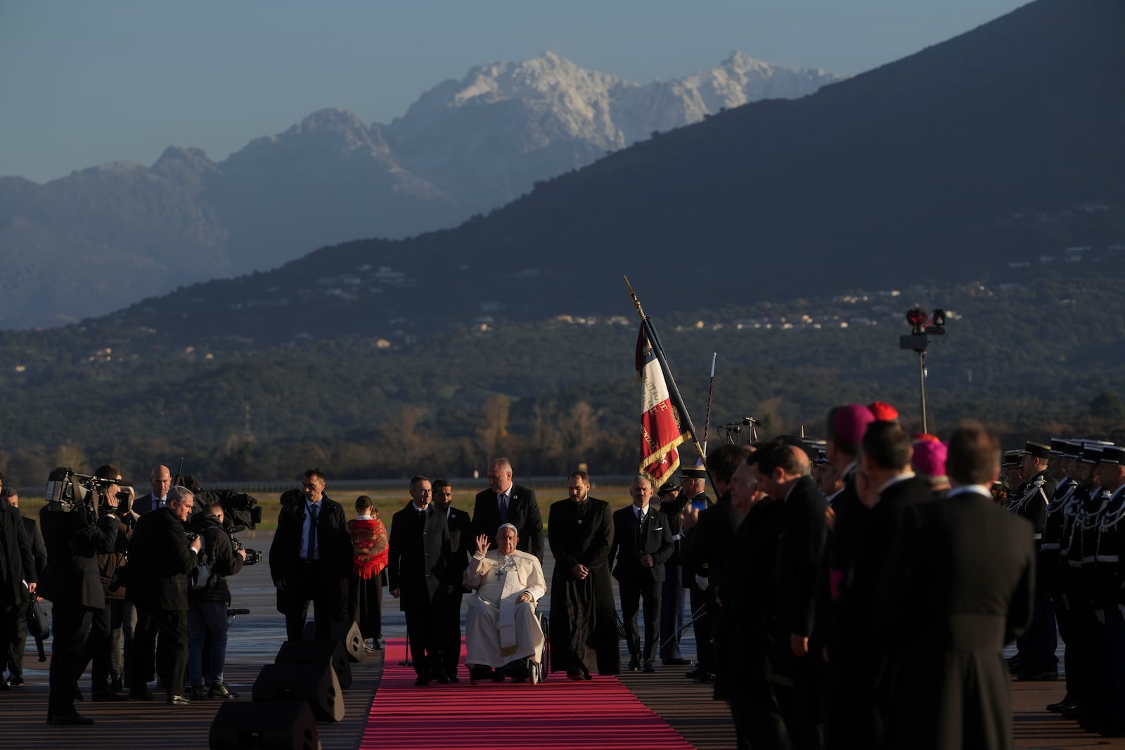 Pope Francis arrives at Ajaccio International Airport on the occasion of his one-day visit in the French island of Corsica, Sunday, Dec. 15, 2024. (AP Photo/Alessandra Tarantino)