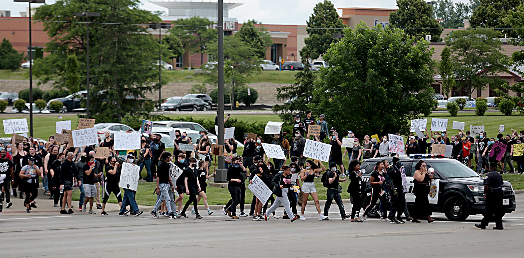 PHOTOS: Demonstrators rally for justice in Beavercreek