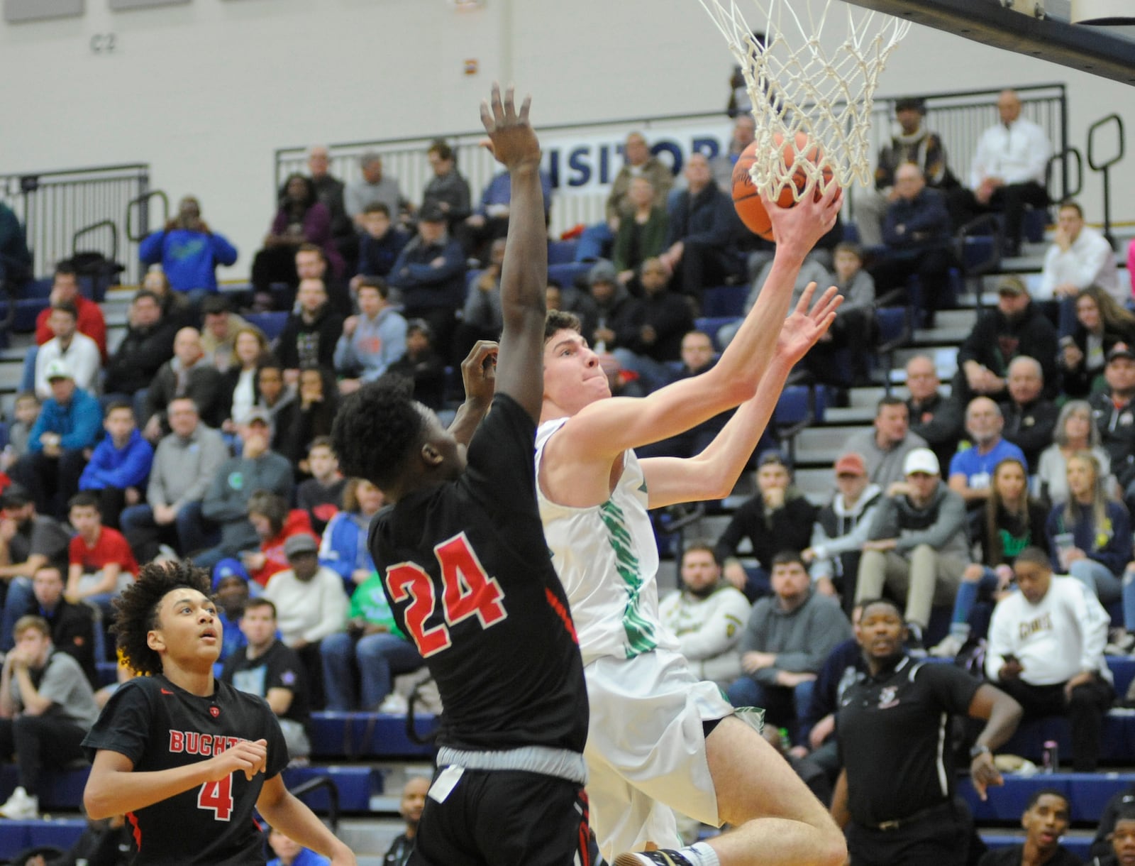 CJ’s Dan Nauseef (with ball) breaks to the basket. MARC PENDLETON / STAFF