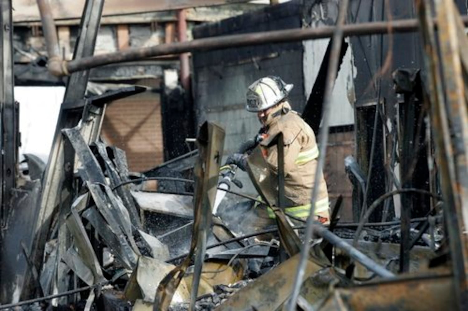 Page Manor shopping center damaged by fire