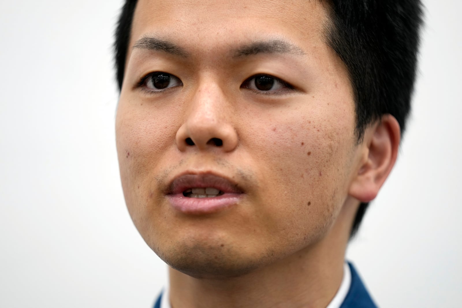 Hiroshi Ide, a TEPCO staff, speaks during an interview with The Associated Press at the Fukushima Daiichi nuclear power plant, operated by Tokyo Electric Power Company Holdings (TEPCO), in Okuma town, northeastern Japan on Monday Feb. 20, 2025. (AP Photo/Eugene Hoshiko)