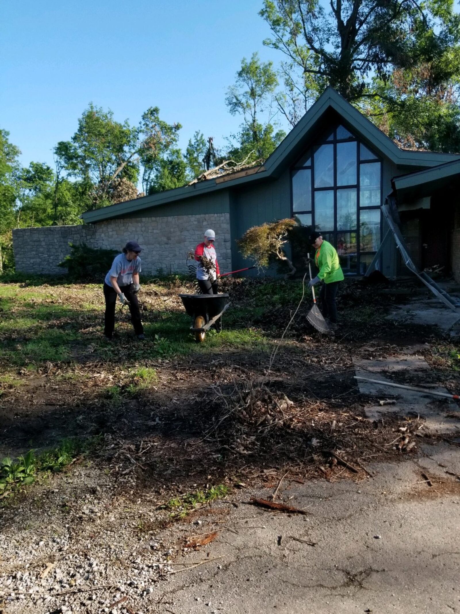 Volunteers gathered Friday, June 21, 2019, to clean up the Russ Nature Reserve in Beavercreek after it was significantly damaged in the Memorial Day tornadoes. LYDIA BICE/STAFF