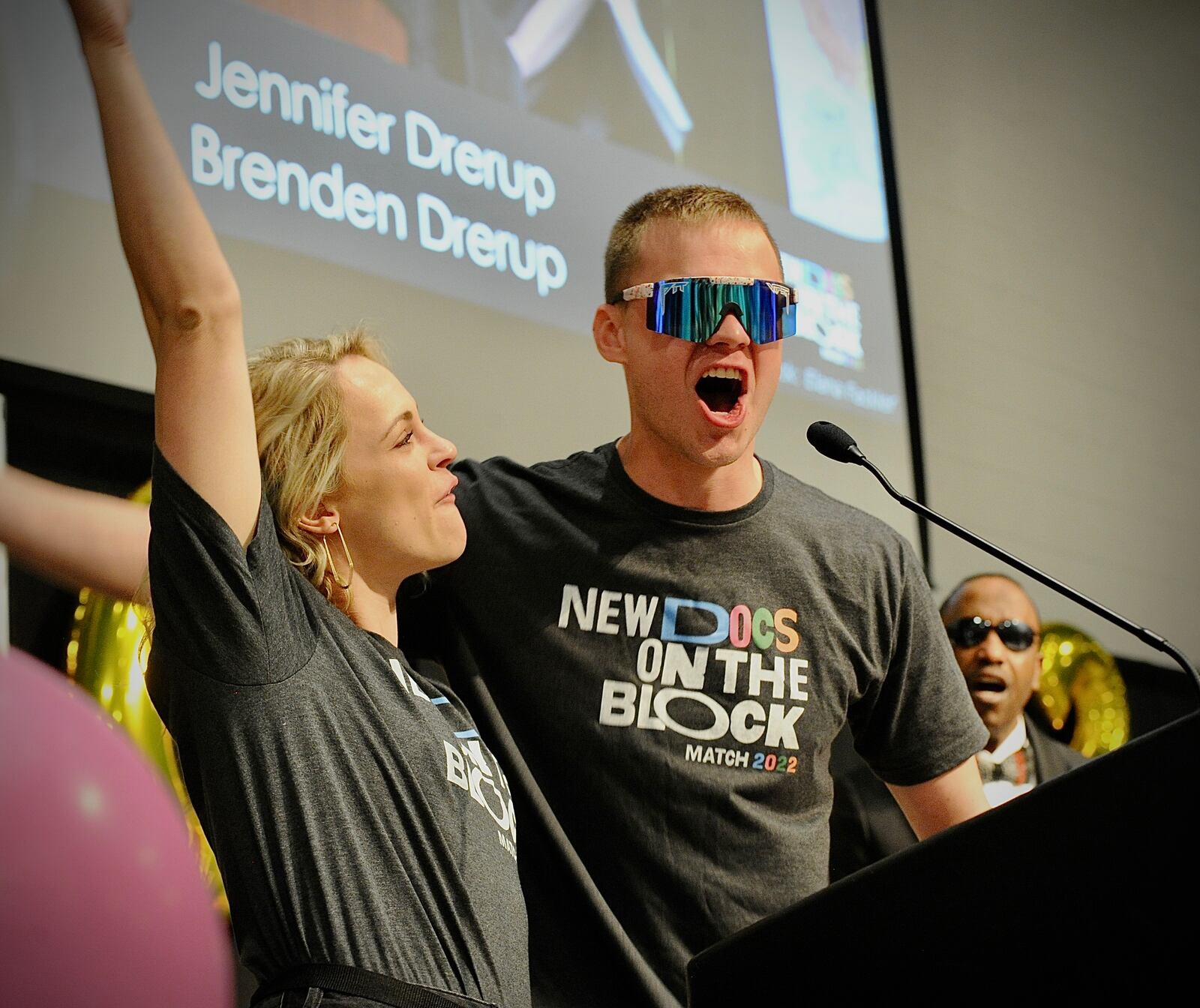 Wright State University Medical students Jennifer and Brenden Drerup celebrate during Match Day Friday March 18, 2022. MARSHALL GORBY\STAFF