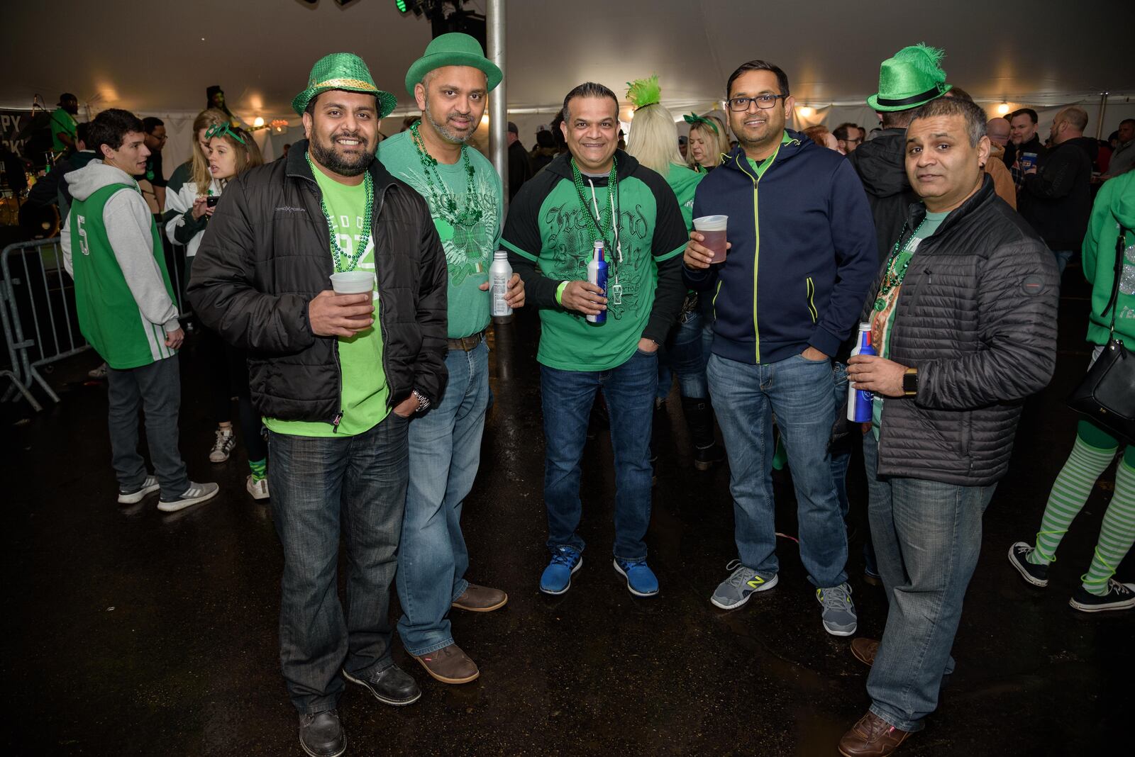 The St Patrick's Day party at Flanagan’s Pub, on 101 E. Stewart St. near the University of Dayton, is a longstanding local tradition. The event draws about 4,000 and includes a full day of live music in the tent set up in the pub's parking lot. TOM GILLIAM / CONTRIBUTING PHOTOGRAPHER