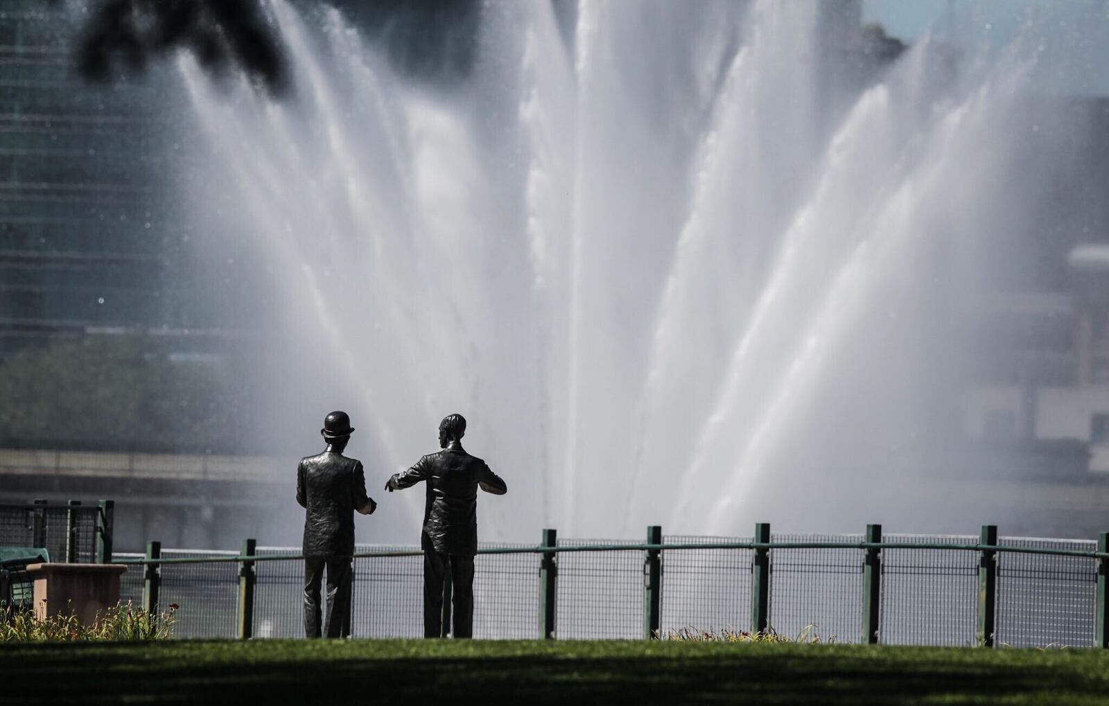 Dayton tourism numbers have dropped because of COVID-19, but Miami Valley residents can take in the sites around Dayton like Wilbur and Orville Wright statues that are watching the river fountains at Deeds Park in Dayton Thursday August 20, 2020. Jim Noelker/Staff