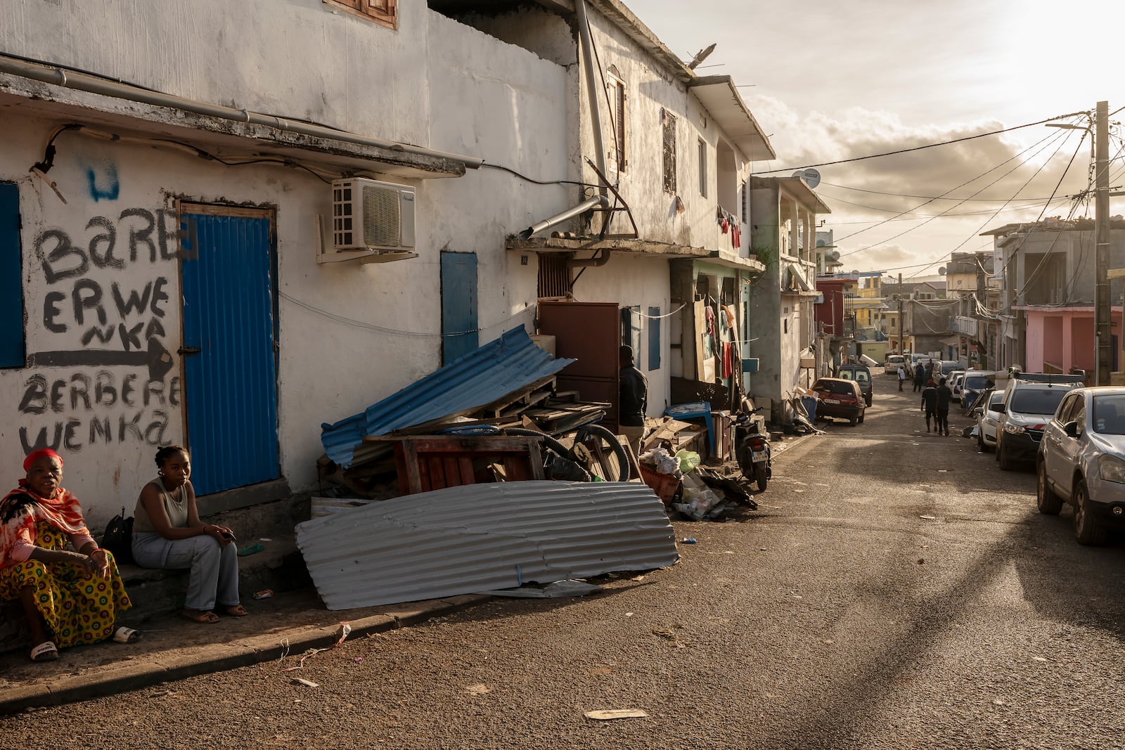 Cleared debris after Cyclone Chido are seen in the Kaweni slum on the outskirts of Mamoudzou, in the French Indian Ocean island of Mayotte, Thursday, Dec. 19, 2024. (AP Photo/Adrienne Surprenant)