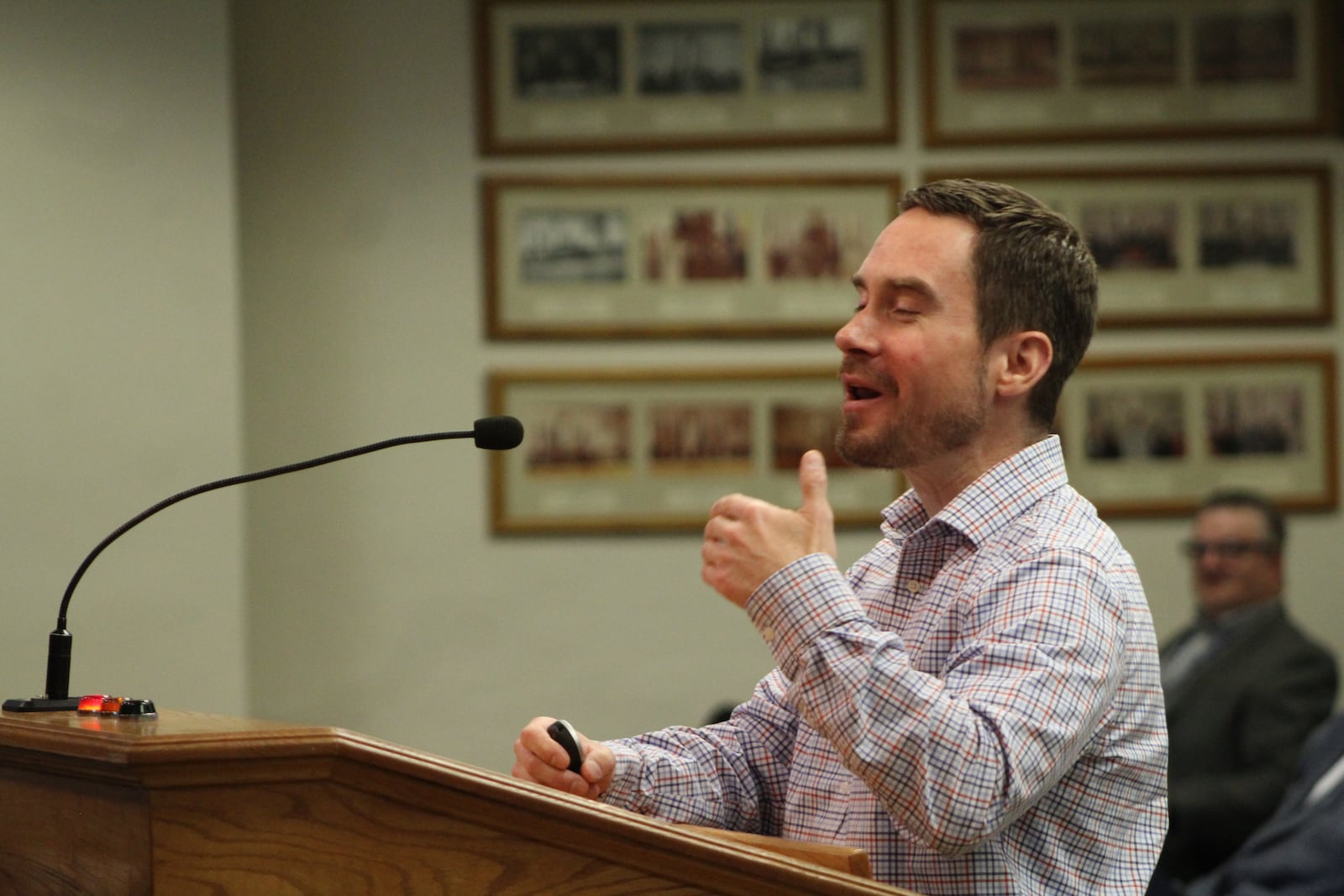 Chris Mackey, community impact and engagement manager with Big Brothers Big Sisters Miami Valley, at a Dayton City Commission meeting. CORNELIUS FROLIK / STAFF