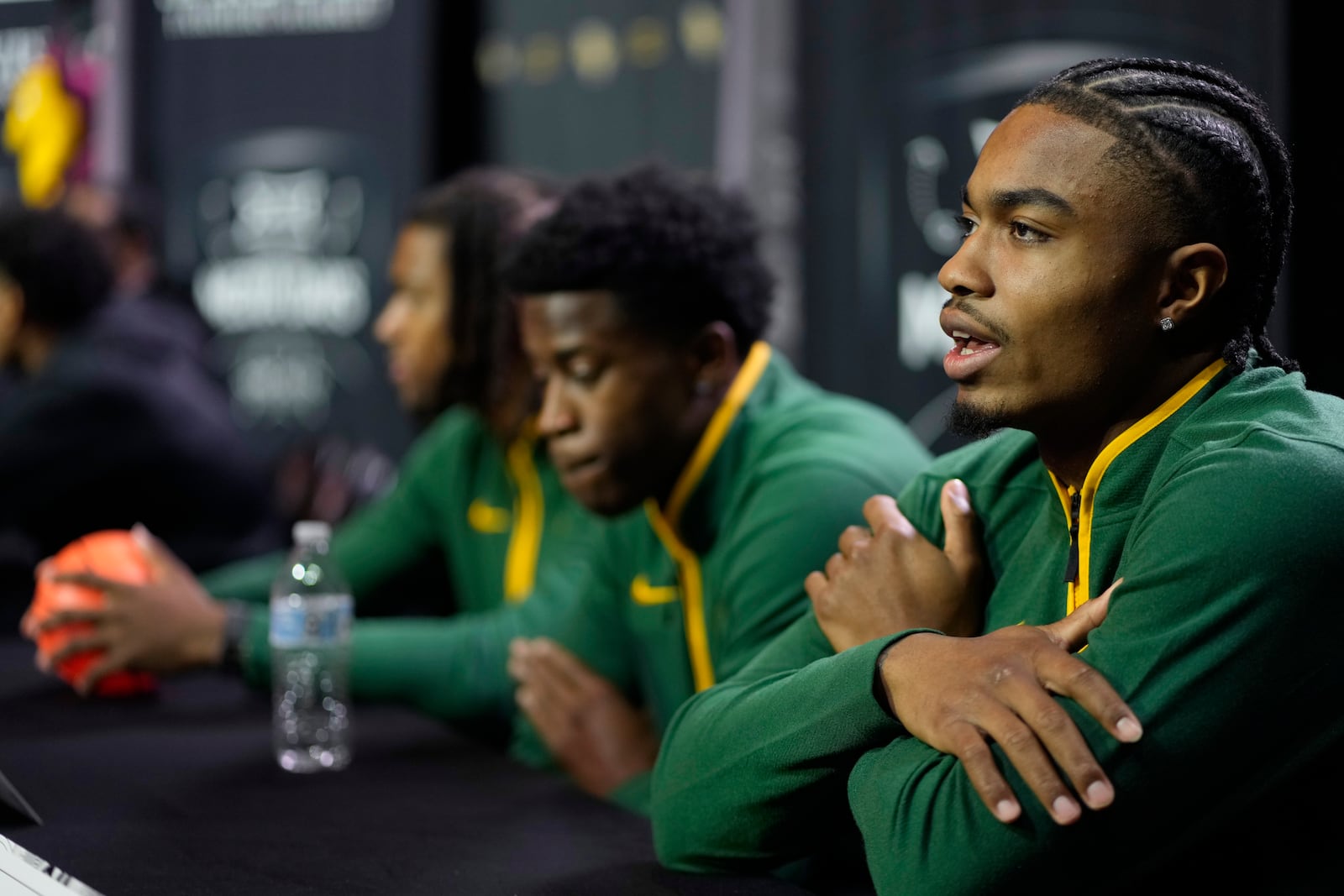 Baylor's Langston Love addresses the media during the NCAA college Big 12 men's basketball media day, Wednesday, Oct. 23, 2024, in Kansas City, Mo. (AP Photo/Charlie Riedel)