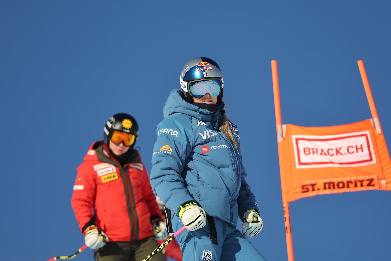 United States' Lindsey Vonn does a course inspection before competing in an alpine ski, women's World Cup super G, in St. Moritz, Switzerland, Saturday, Dec. 21, 2024. (AP Photo/Marco Trovati)