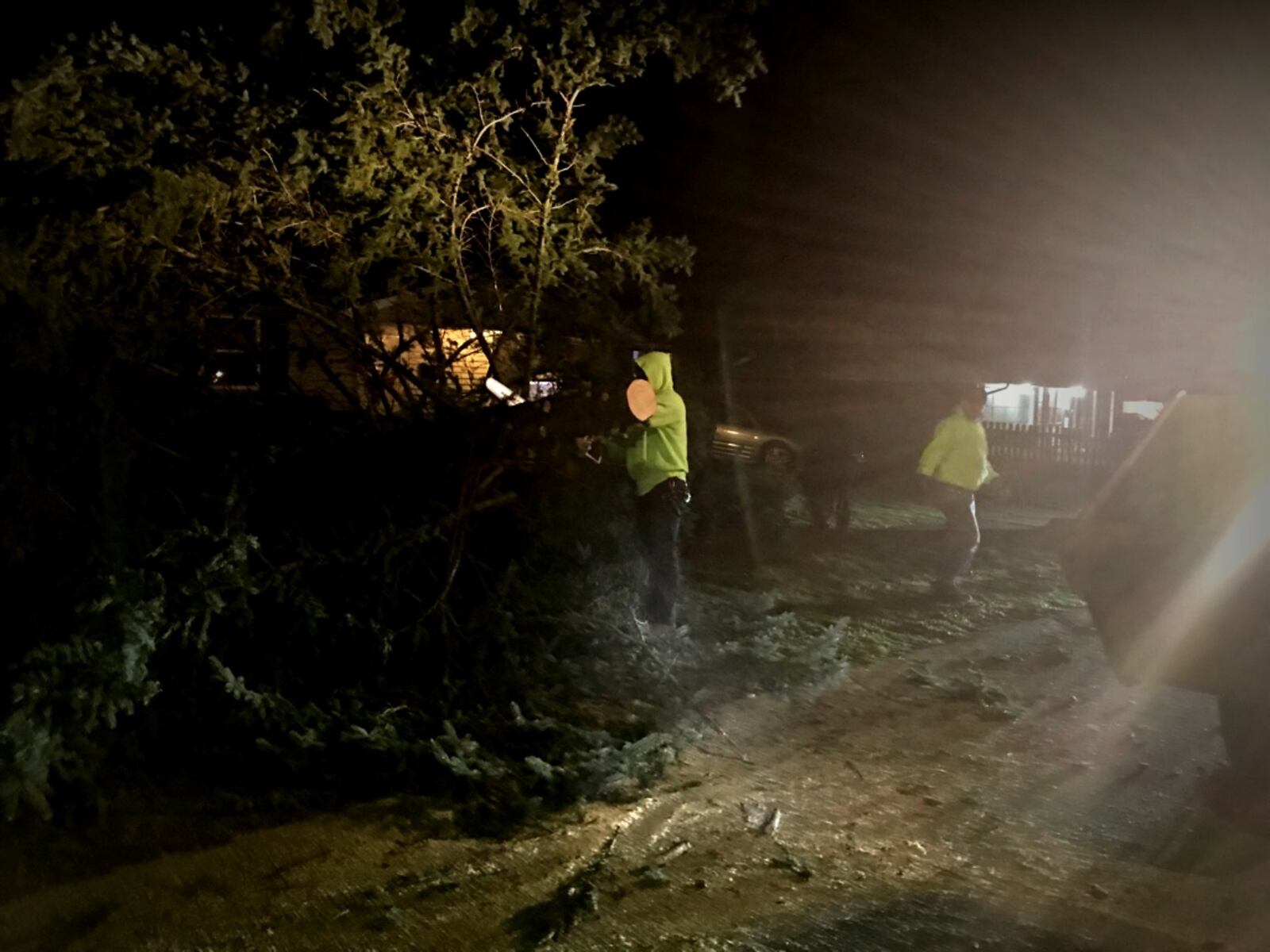 This tree, blown over by high winds, hit a parked vehicle on Hemingway Road in Huber Heights on Wednesday night, March 1, 2017. (Jim Noelker/Staff)