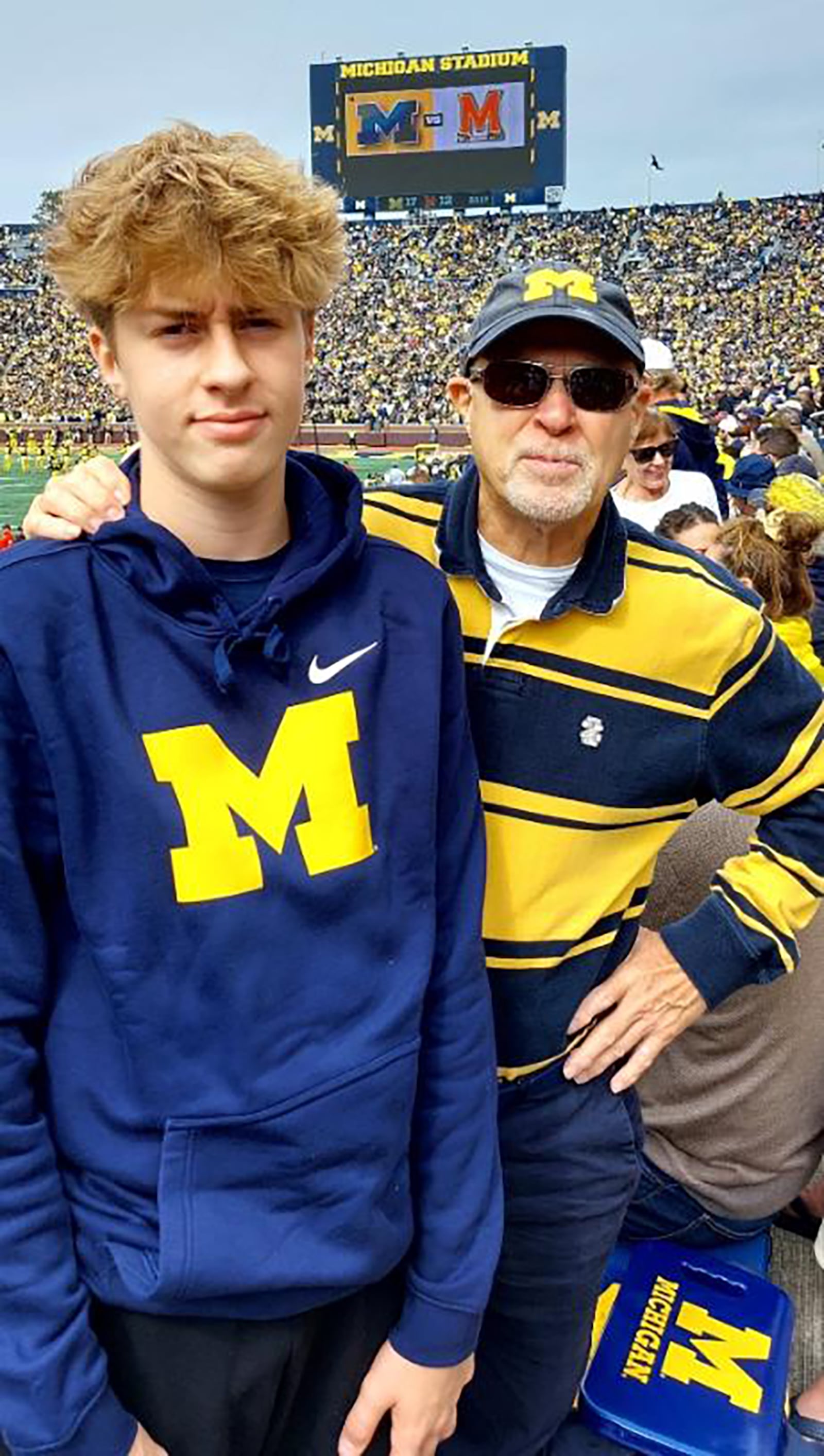 Ian (L) and Spencer Myers at a University of Michigan football game.