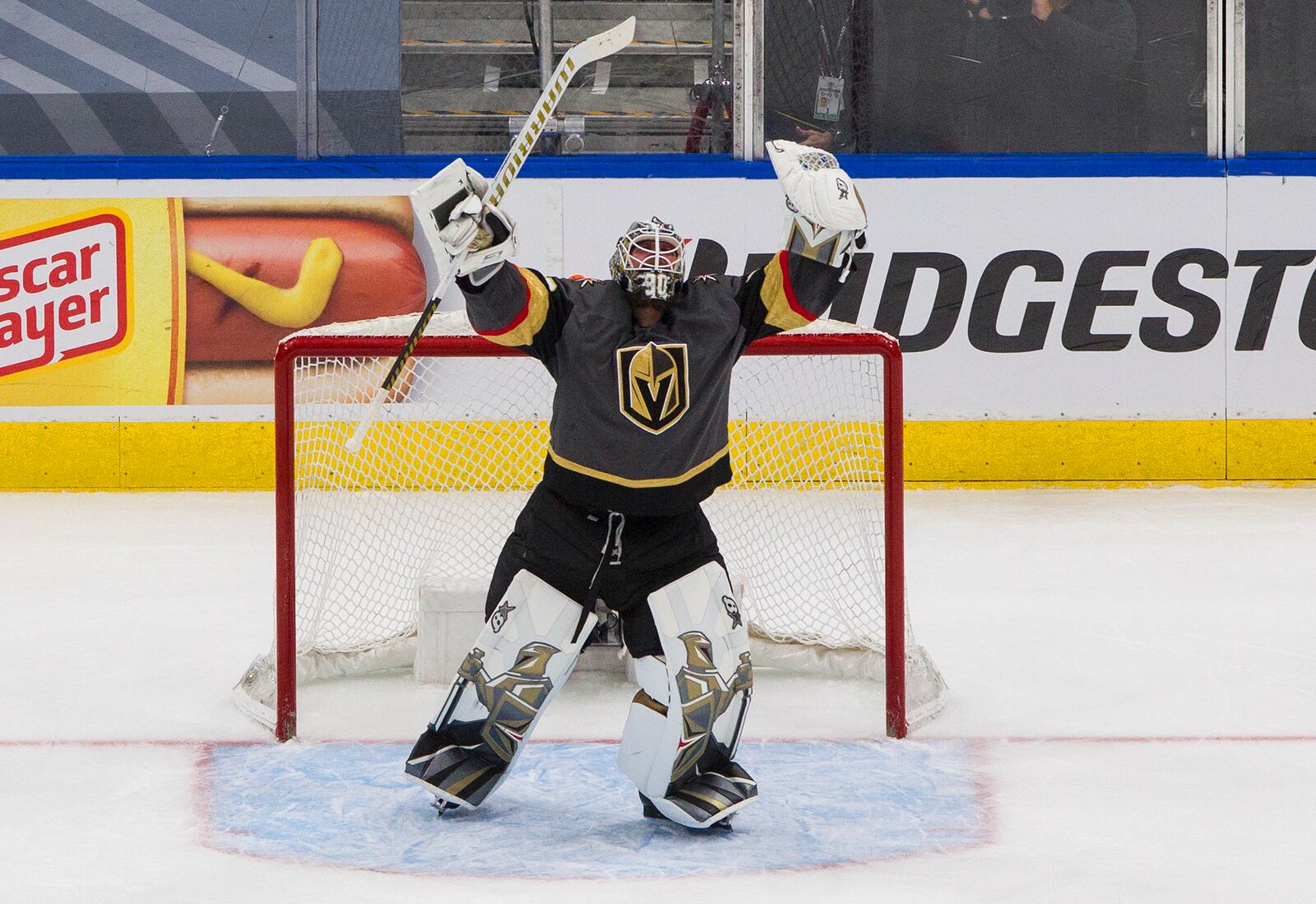 Vegas Golden Knights goalie Robin Lehner celebrates the team's win over the Vancouver Canucks in Game 7 of an NHL hockey second-round playoff series, Friday, Sept. 4, 2020, in Edmonton, Alberta. (Jason Franson/The Canadian Press via AP)