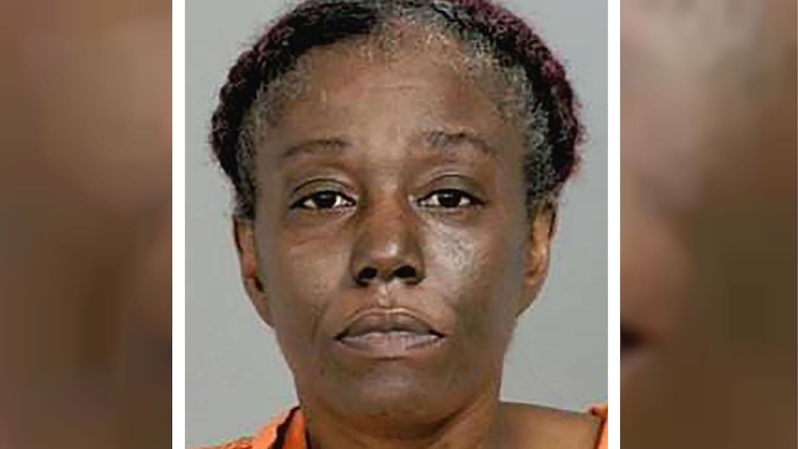 Sharmel Lashe Teague, 45, of Flint, Mich., is charged in connection with the killing of a Family Dollar security guard Friday, May 1, 2020. Authorities say Teague is accused of spitting on Calvin James Munerlyn, 43, before leaving and getting her husband and son, who returned and killed Munerlyn. The guard had refused to allow Teague into the store without a face mask. (Genesee County Prosecutor's Office via AP)