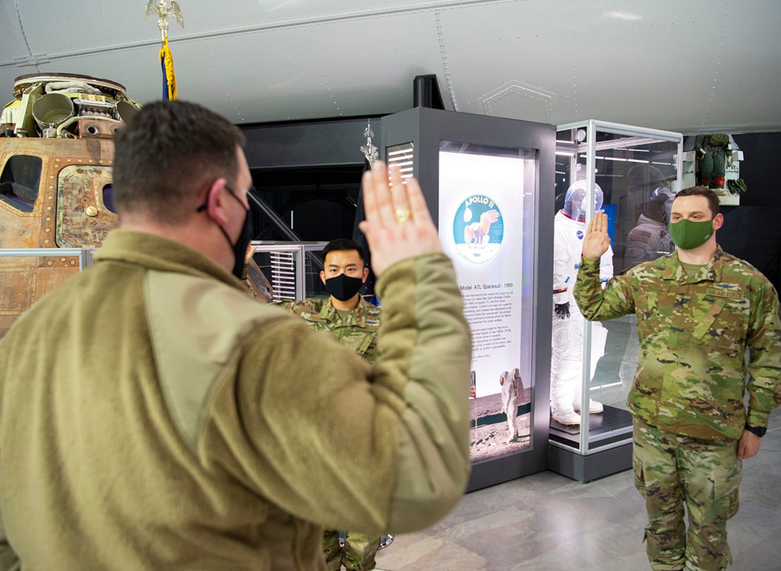 Air Force 1st Lt. Wyatt Chen and 1st Lt. Kyle McReynolds, both with the 88th Communications Squadron, take the oath of office on Feb. 11, joining the U.S. Space Force during a ceremony at the National Museum of the U.S. Air Force on Wright-Patterson Air Force Base. Air Force Lt. Col. Jeffrey Crépeau, 88 CS commander, administered the oath. U.S. AIR FORCE PHOTO/R.J. ORIEZ