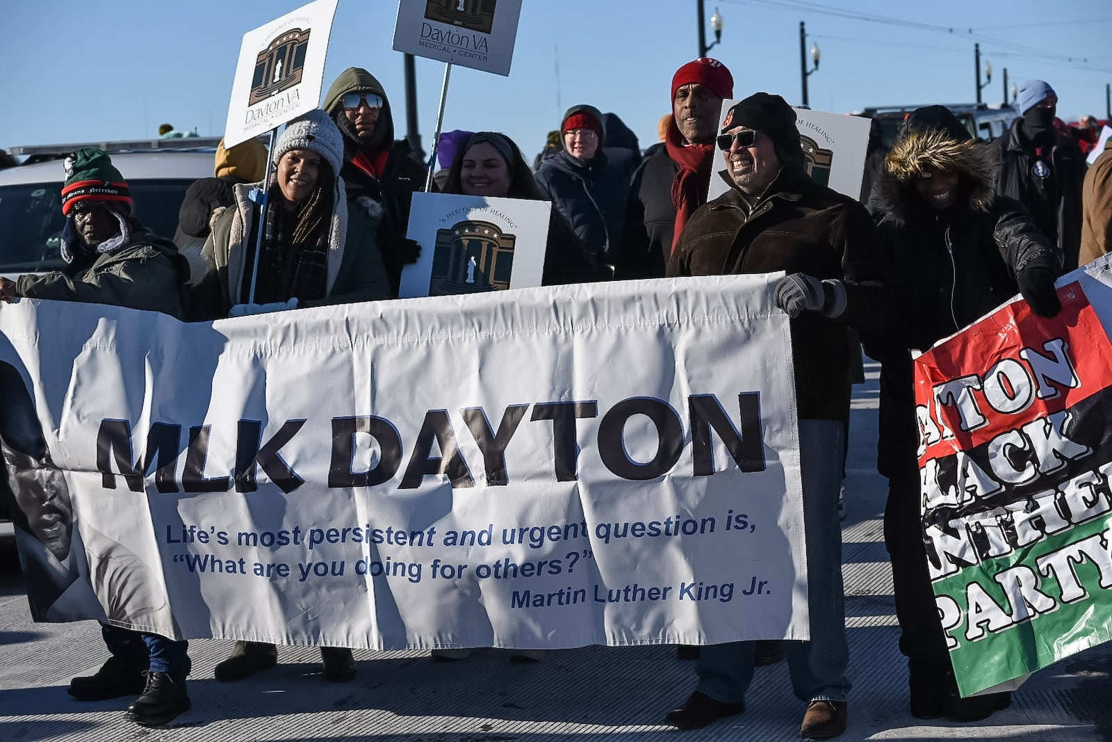 Daytonians gathered to honor Dr. Martin Luther King Jr. at the annual MLK Day Memorial March on Monday, Jan. 20, 2025 amid subzero wind chills. The march started at the Drew Health Center on W. Third St. through the Wright Dunbar Business District and concluded on the Dayton Peace Bridge. TOM GILLIAM / CONTRIBUTING PHOTOGRAPHER