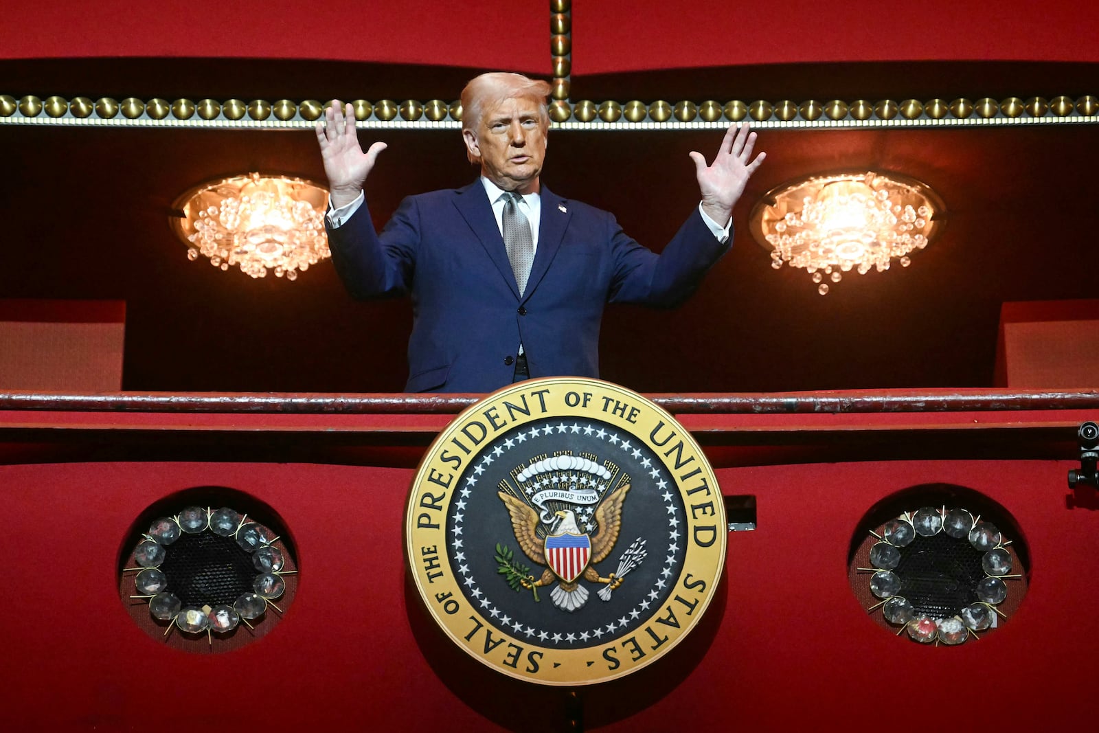 President Donald Trump stands in the presidential box as he tours the John F. Kennedy Center for the Performing Arts in Washington, Monday, March 17, 2025. (Pool via AP)