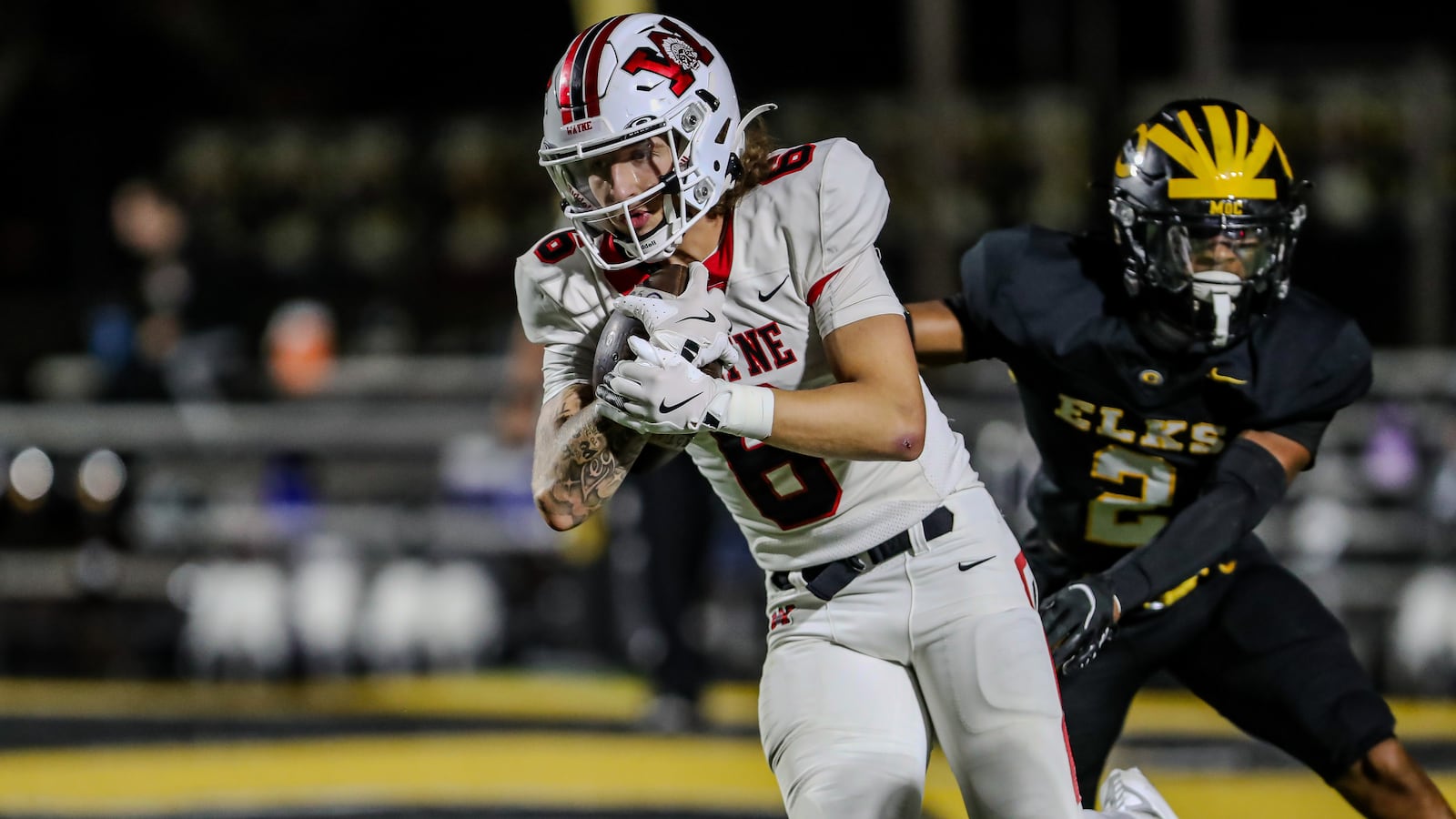 Wayne High School senior Gauge Miesse runs the ball during their game against Centerville on Friday night at Centerville Stadium. The Elks won 38-14. CONTRIBUTED PHOTO BY MICHAEL COOPER