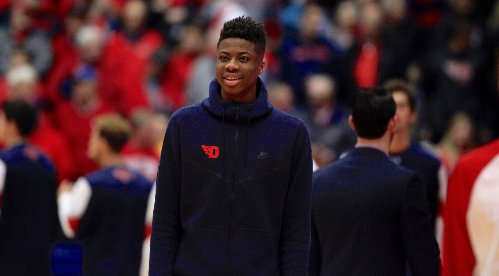 Dayton's Kostas Antetokounmpo watches the Flyers warm up before a game against Saint Mary's on Saturday, Nov. 19, 2016, at UD Arena. David Jablonski/Staff