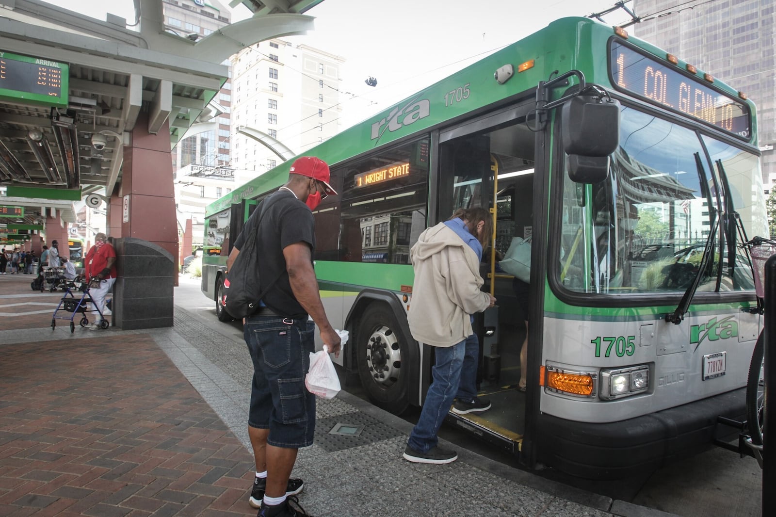 Ridership for RTA has fluctuated since the COVID-19 outbreak in March, and, right now, ridership is down 40% from 2019. Riders are shown on Thursday, Aug. 13, 2020. JIM NOEKLER/STAFF