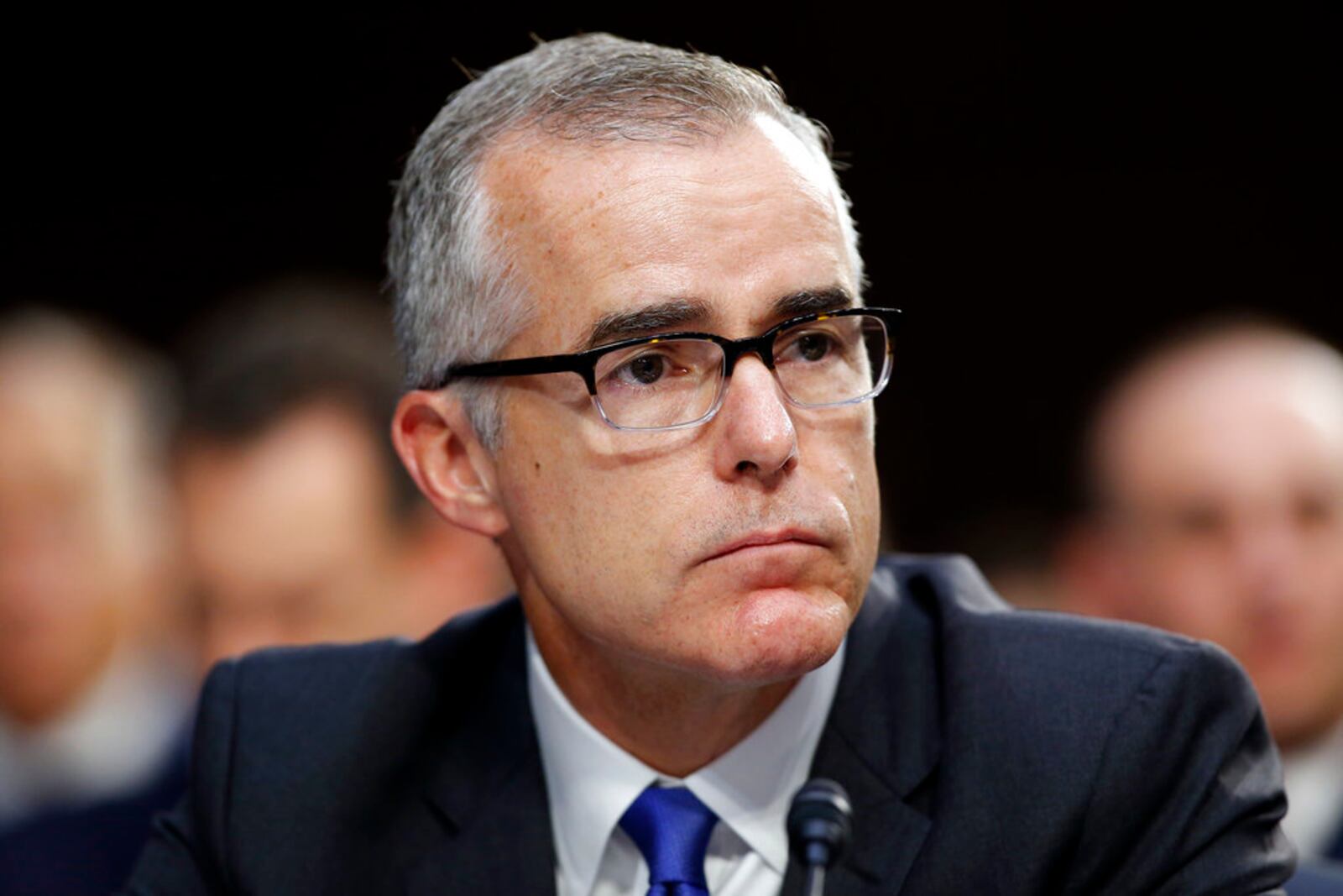 FILE - In this June 7, 2017 file photo, FBI acting director Andrew McCabe listens during a Senate Intelligence Committee hearing about the Foreign Intelligence Surveillance Act, on Capitol Hill in Washington. The Justice Department is reviewing a recommendation that it fire former FBI Deputy Director Andrew McCabe ahead of his forthcoming retirement. Thatâs according to a person familiar with the matter, who spoke on condition of anonymity to discuss an internal disciplinary process. The recommendation was made by the FBIâs Office of Professional Responsibility and was sent to the Justice Department.  (AP Photo/Alex Brandon)