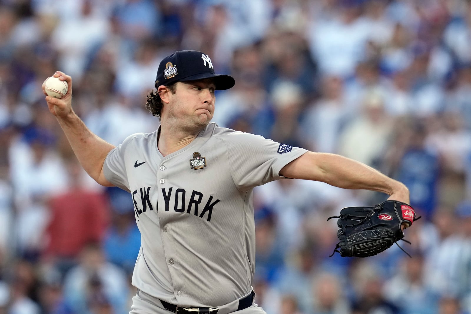 New York Yankees starting pitcher Gerrit Cole throws against the Los Angeles Dodgers during the first inning in Game 1 of the baseball World Series, Friday, Oct. 25, 2024, in Los Angeles. (AP Photo/Godofredo A. Vásquez)