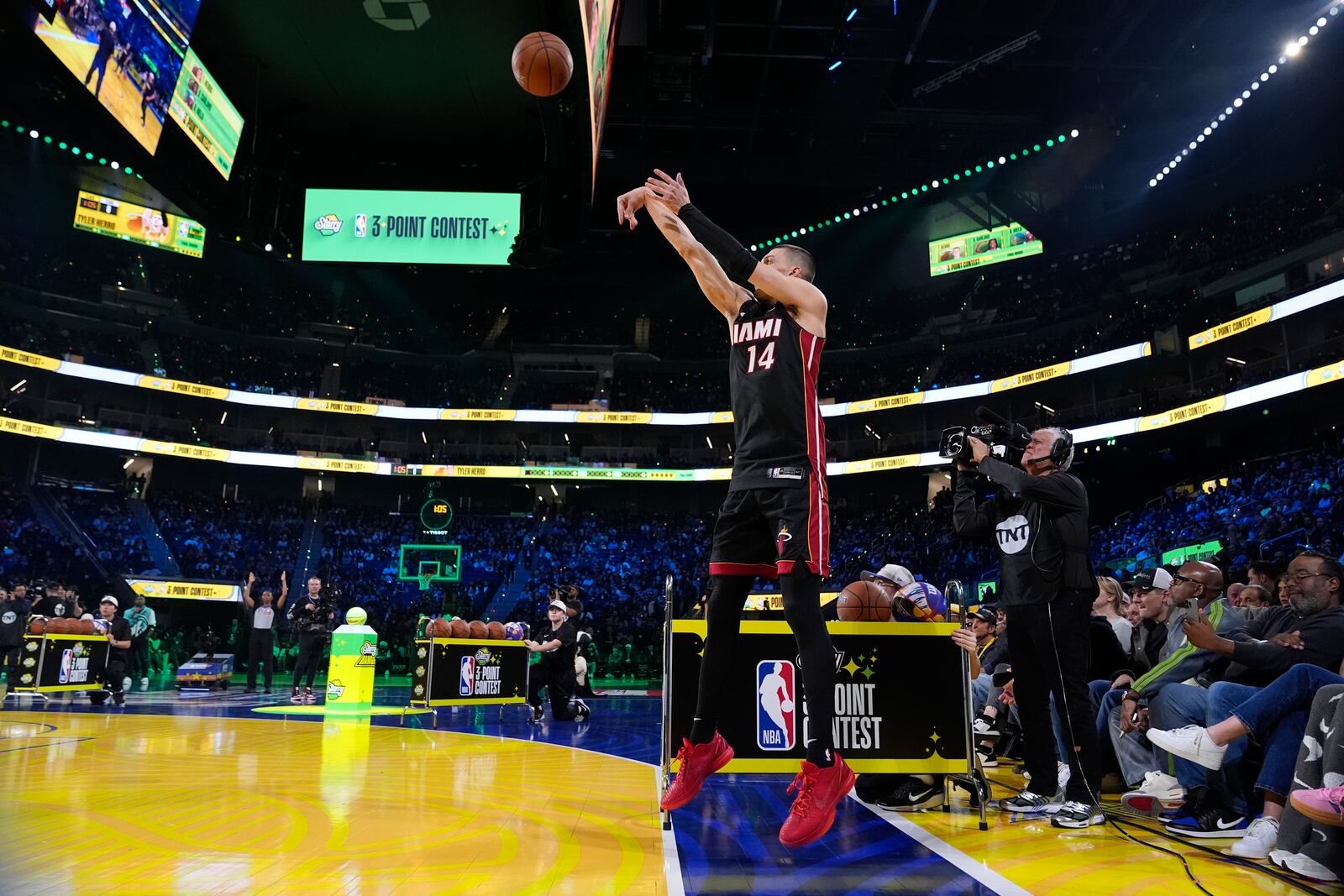 Miami Heat guard Tyler Herro shoots during the 3-point contest at the NBA basketball All-Star Saturday night festivities Saturday, Feb. 15, 2025, in San Francisco. (AP Photo/Godofredo A. Vásquez)