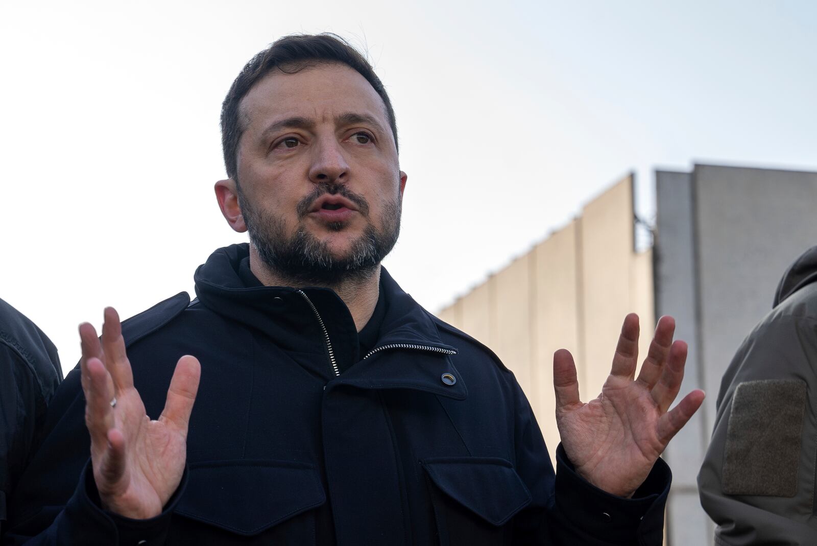 Volodymyr Zelenskyy, president of Ukraine speaks to the press during a media briefing on the territory of Khmelnytskyi Nuclear Power Plant, Ukraine, Thursday, Feb. 13, 2025. (AP Photo/Alex Babenko)