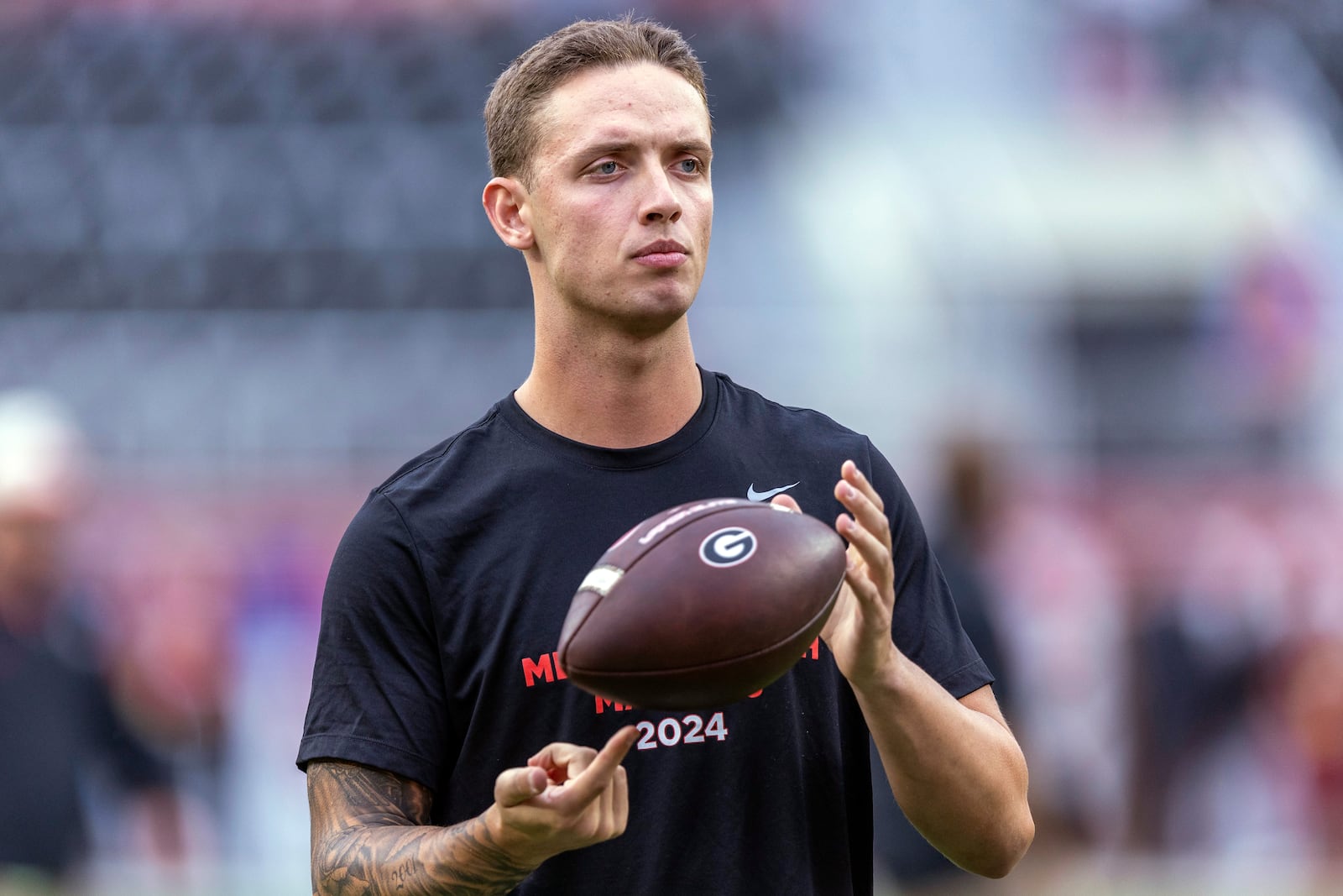 FILE - Georgia quarterback Carson Beck (15) takes the field for early warm-ups before an NCAA college football game against Alabama, Saturday, Sept. 28, 2024, in Tuscaloosa, Ala. (AP Photo/Vasha Hunt, File)