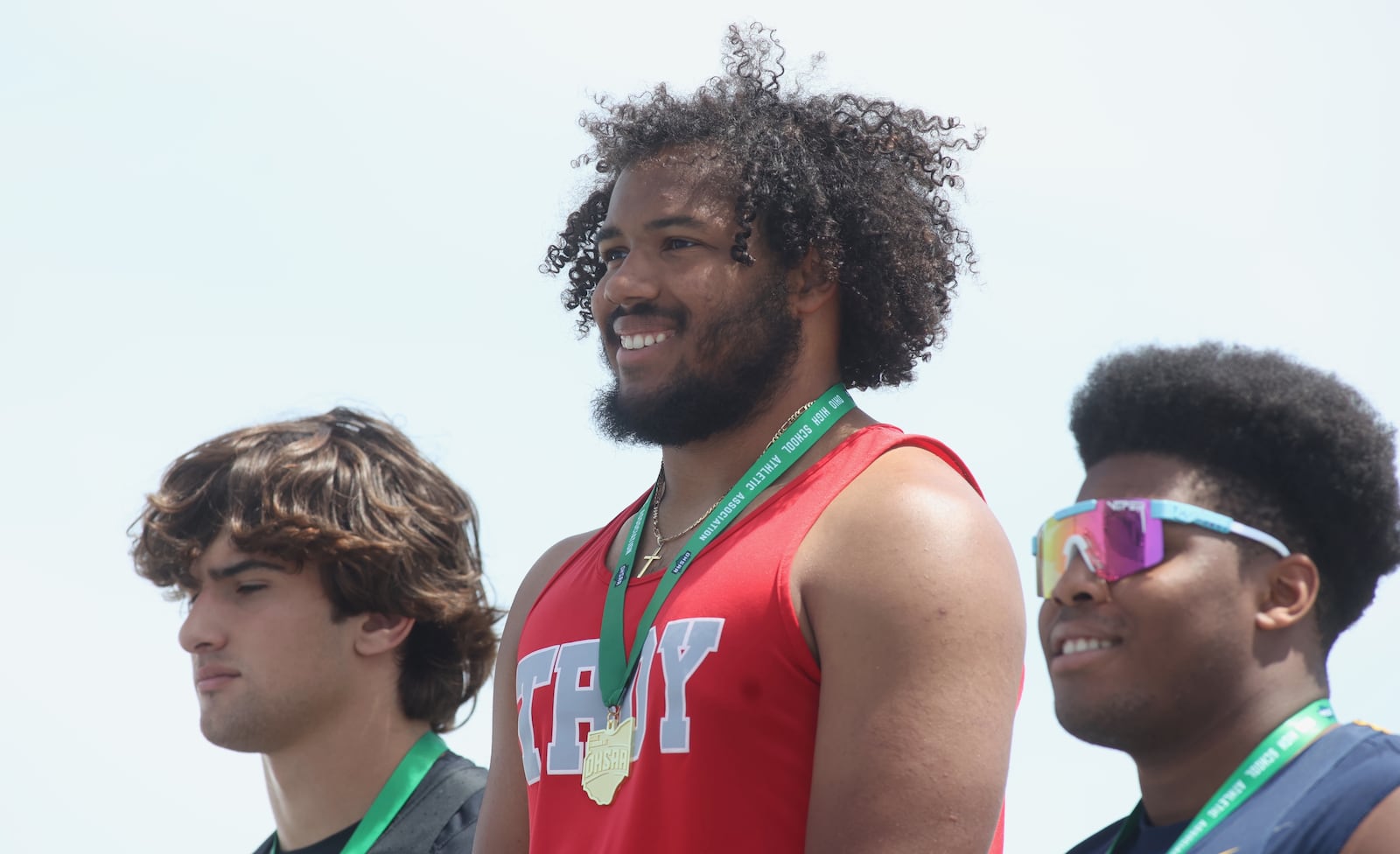 Troy's Devon Strobel stands atop the podium after winning the discus at the OHSAA Division I state track and field championships on Saturday, June 1, 2024, at Welcome Stadium in Dayton. David Jablonski/Staff