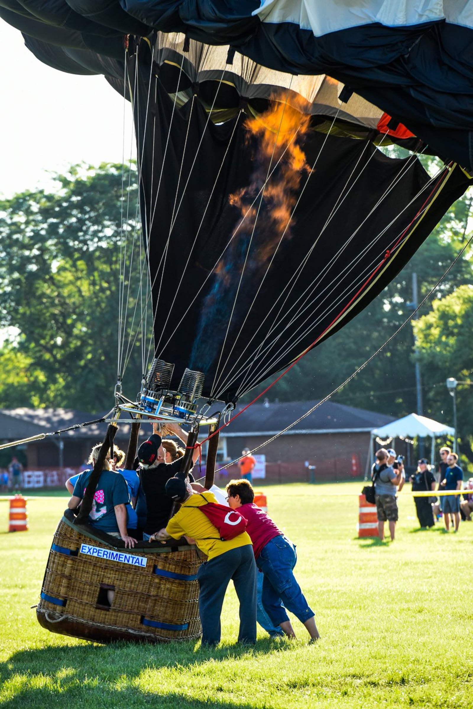 Hot air balloons are inflated for attendees to get a closer look during the Ohio Challenge Hot Air Balloon Festival at Smith Park in Middletown in 2016. NICK GRAHAM/STAFF