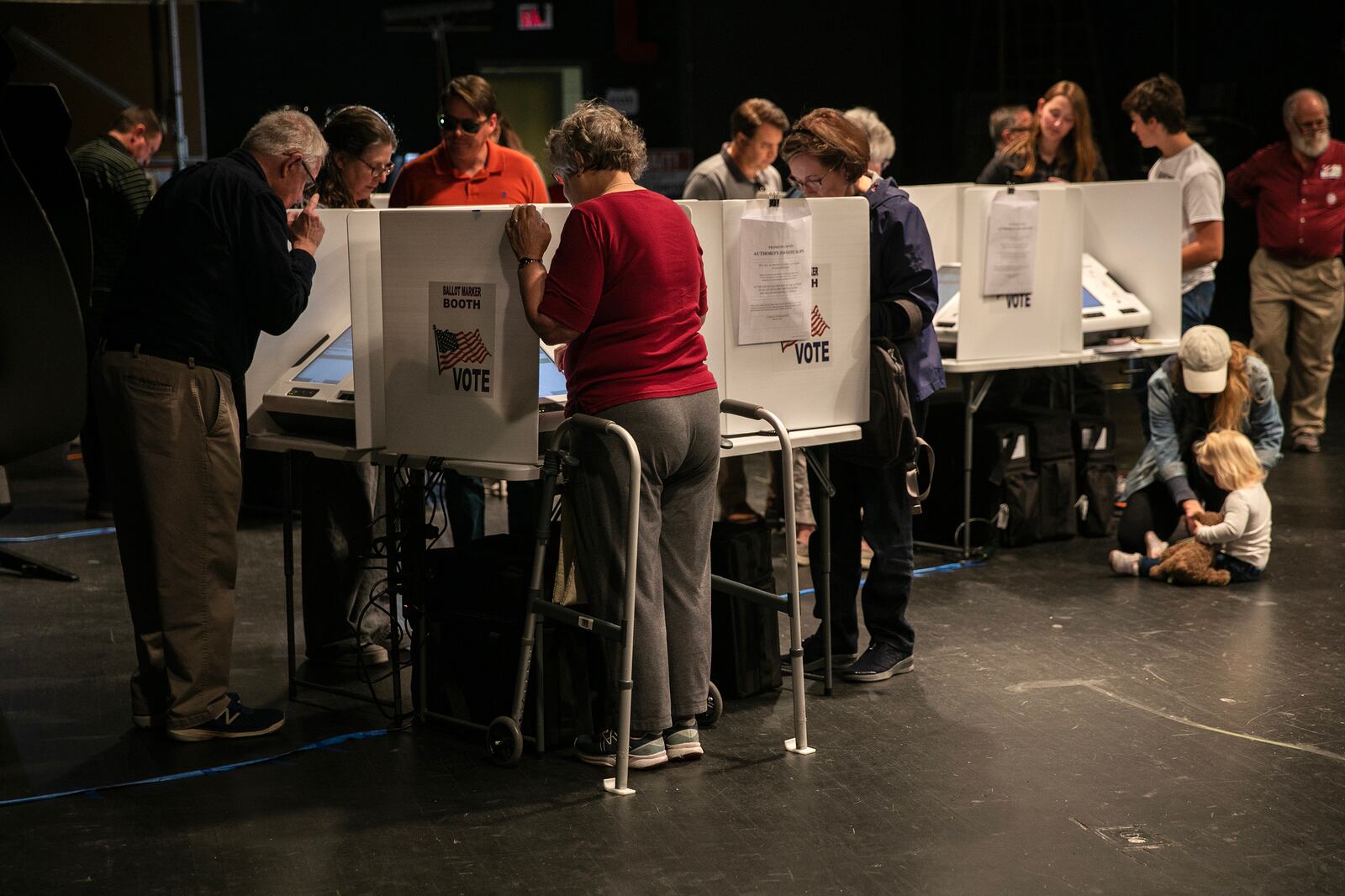 
                        Voters cast their ballots on a stage at Worthington Kilbourne High School on Election Day in Columbus, Ohio, Nov. 7, 2023. Voters headed to the polls in several states on Tuesday as this off-year election culminates with some key races on the line for Democrats and Republicans. (Maddie McGarvey/The New York Times)
                      