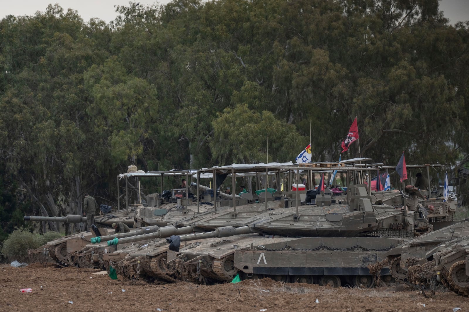 Israeli tanks at a staging area near the border with the Gaza Strip, in southern Israel, Sunday, Feb. 9, 2025. (Photo/Ohad Zwigenberg)