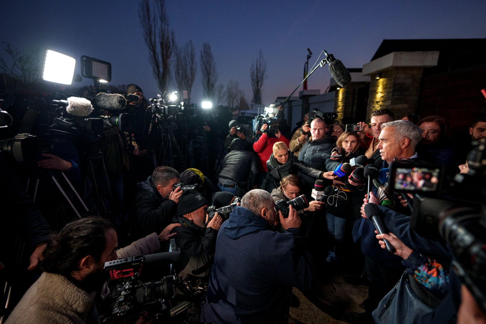 FILE - Calin Georgescu, independent candidate in the presidential elections, speaks to media, in Izvorani, Romania, Tuesday, Nov. 26, 2024, after making it into the December 8 election runoff. (AP Photo/Andreea Alexandru, File)