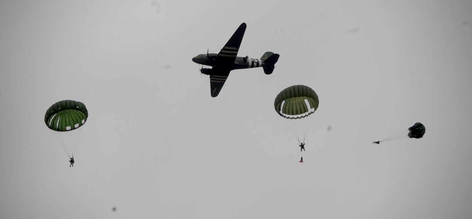 Hundreds gathered at Skydive Greene County to pay tribute to Jim “Pee Wee” Martin, who turns 100 on April 29. Martin was celebrated by a mass jump out of vintage aircraft.