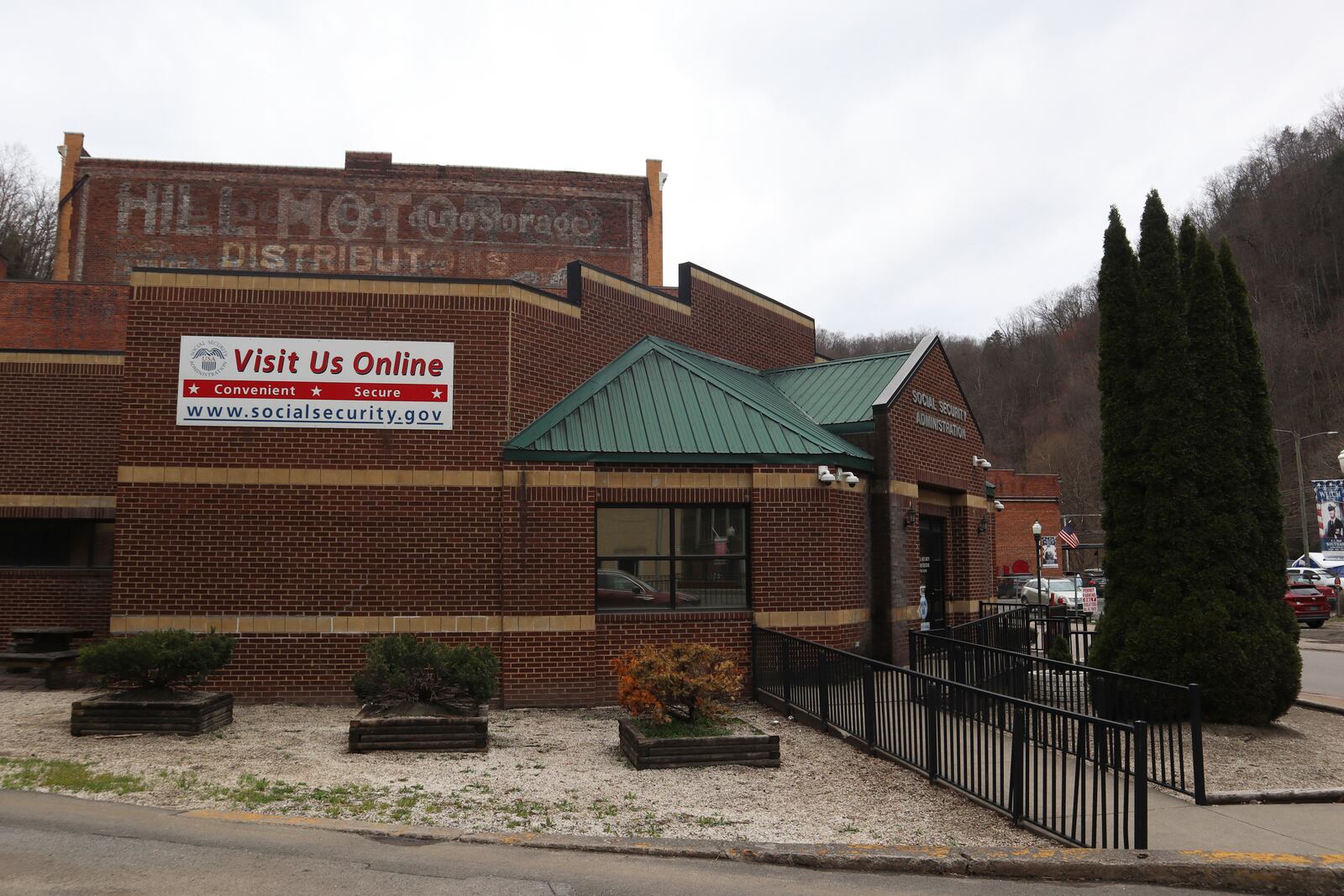 A sign outside the U.S. Social Security Administration advertises its online services in downtown Welch, W.Va., Thursday, March 20, 2025. (AP Photo/Leah Willingham)