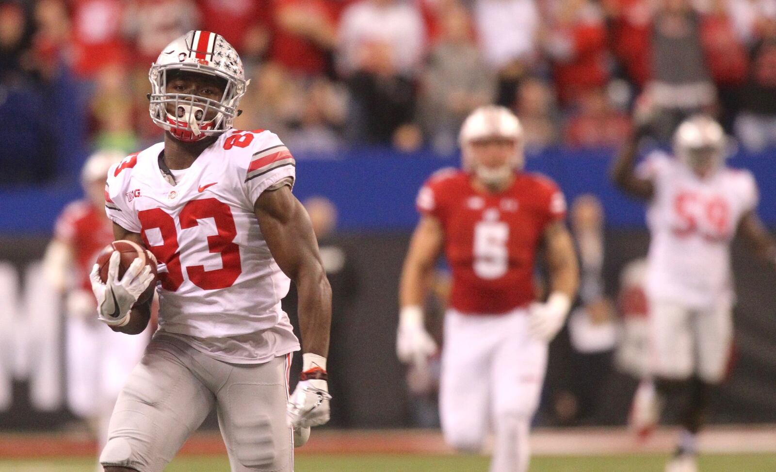 Ohio State’s Terry McLaurin runs after a catch for a touchdown against Wisconsin in the Big Ten Championship on Saturday, Dec. 2, 2017, at Lucas Oil Stadium in Indianapolis, Ind. David Jablonski/Staff