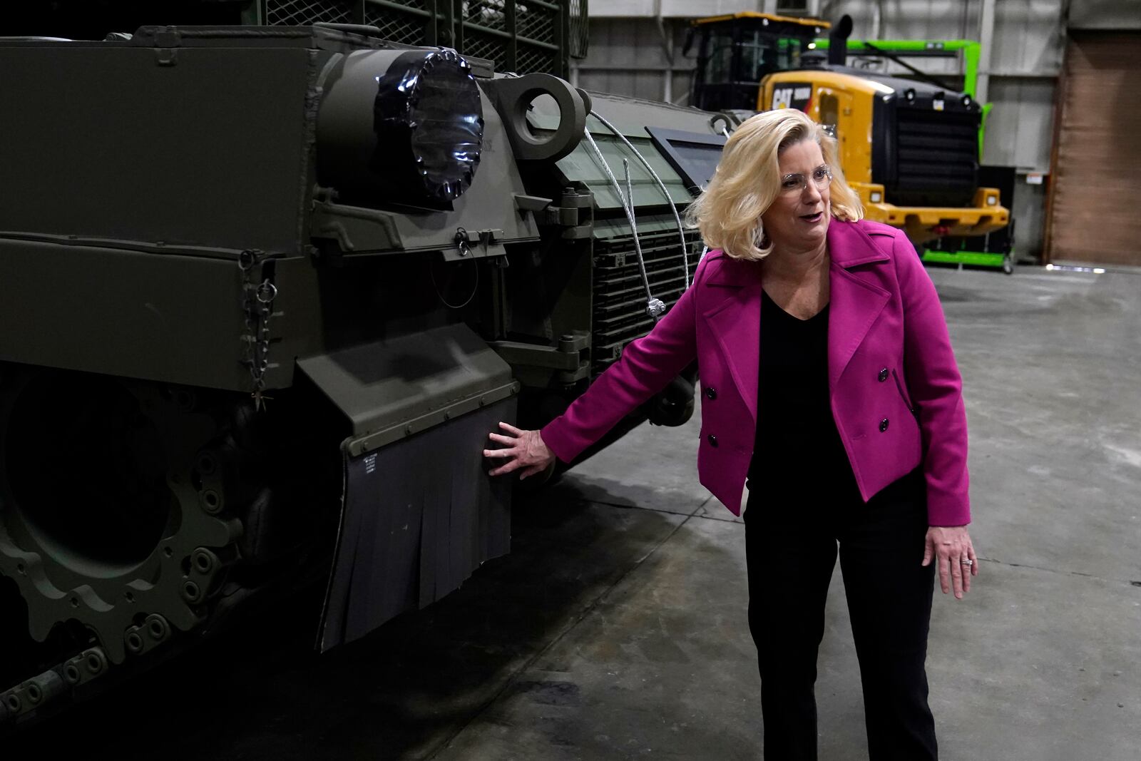 Secretary of the Army Christine Wormuth looks over the latest version of the M1A2 Abrams main battle tank as she tours the Joint Systems Manufacturing Center, Thursday, Feb. 16, 2023, in Lima, Ohio. (AP Photo/Carlos Osorio)