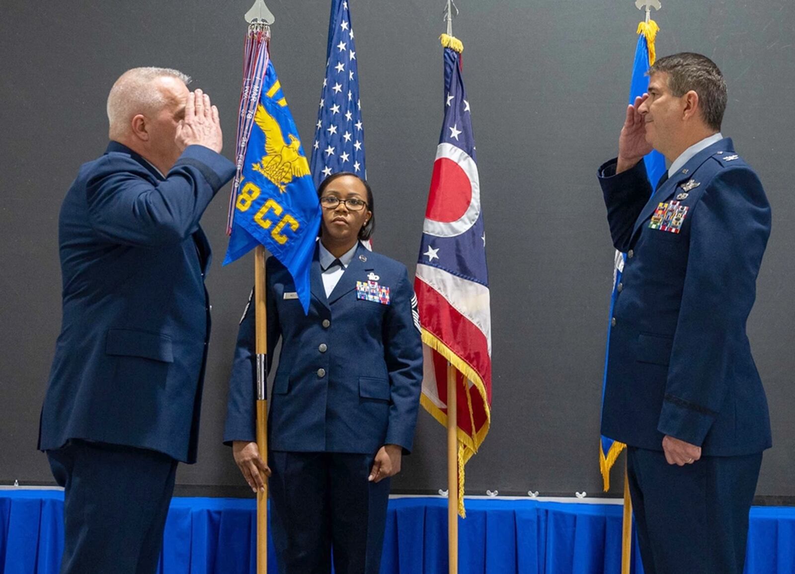 U.S. Air Force Col. Dominic Fago salutes Brig. Gen. David Johnson during a change of command ceremony on Springfield-Beckley Air National Guard Base, Ohio, April 2, 2023. The passing of the guidon represents the change of authority over a military unit. (U.S. Air National Guard photo by Senior Airman Constantine Bambakidis) 